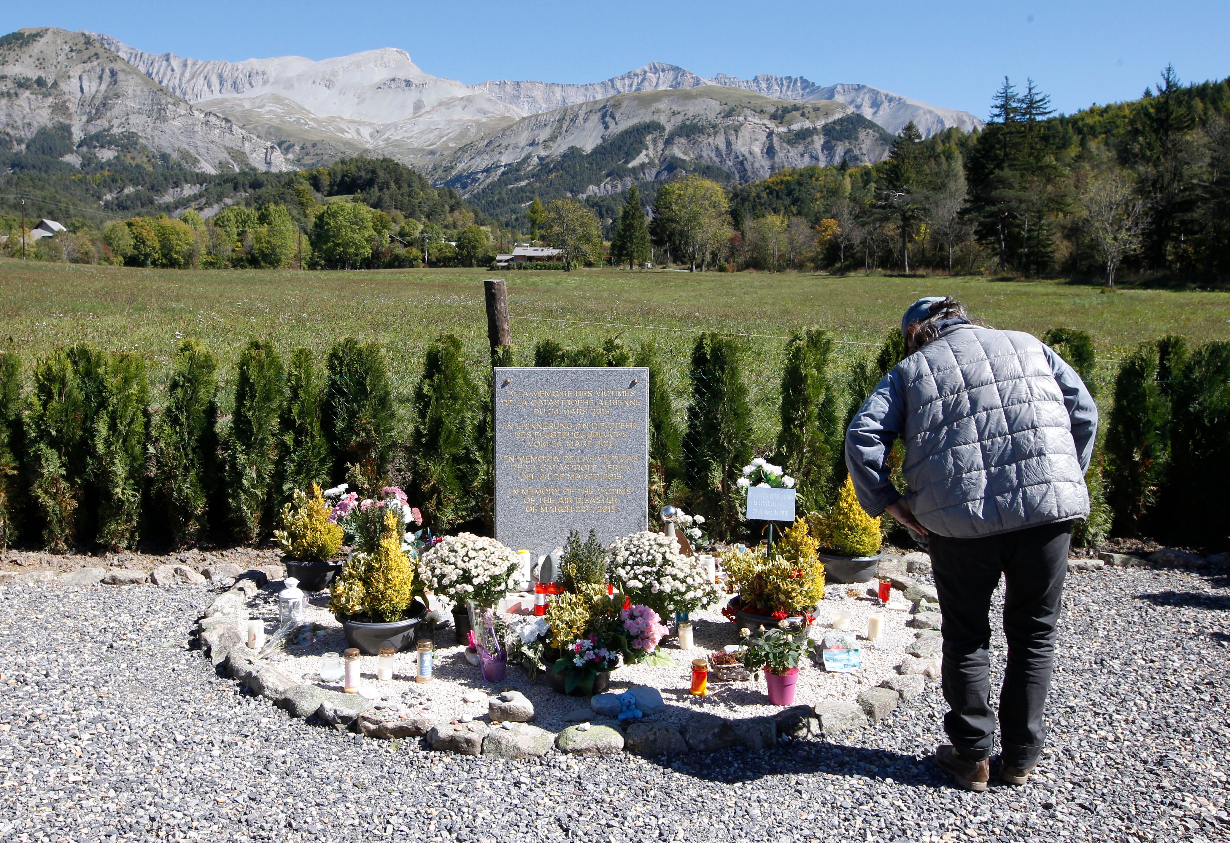 A man pays his respects to the Germanwings victims in Le Vernet