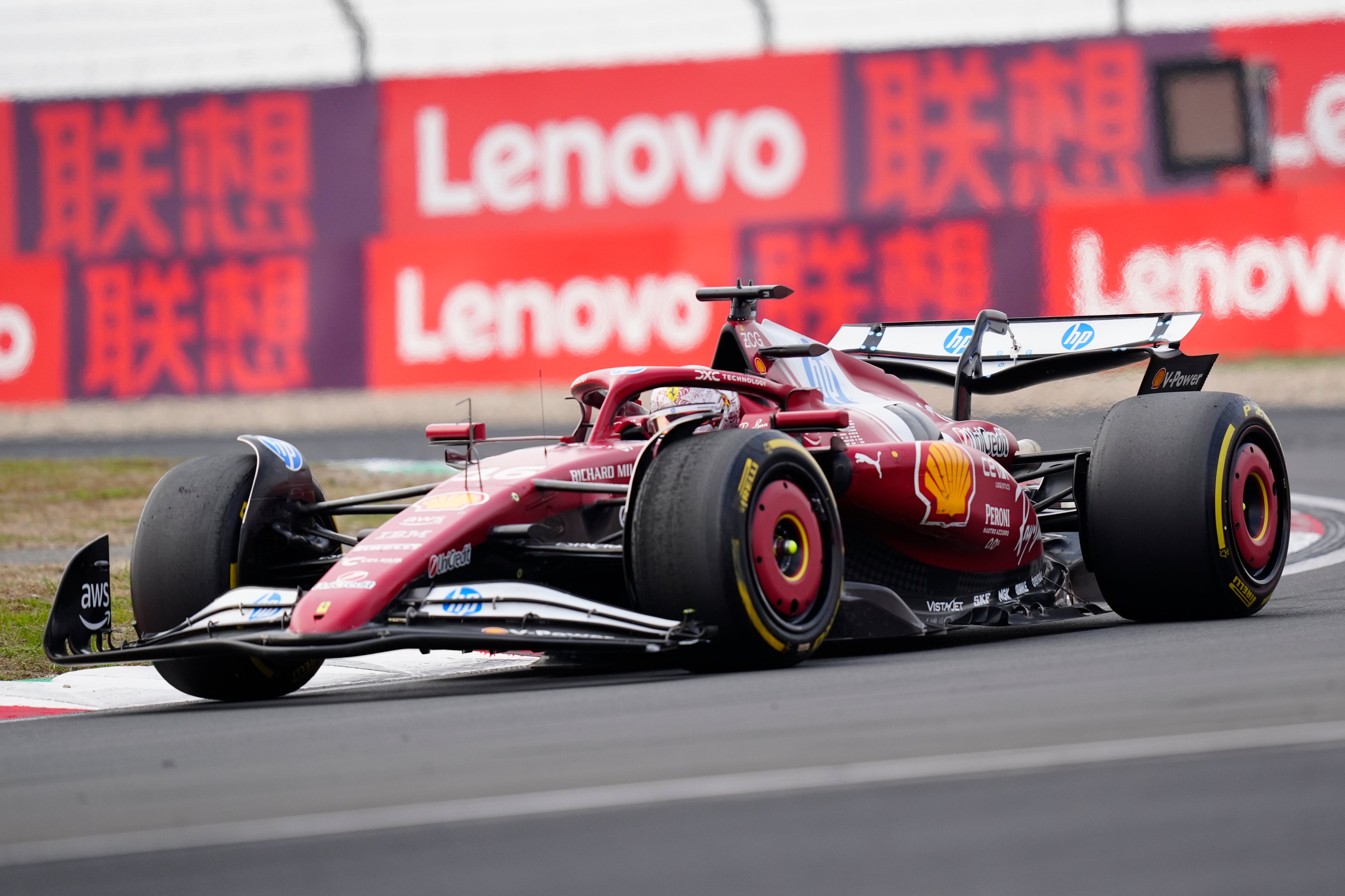 Charles Leclerc suffered early damage to his front wing (AP)