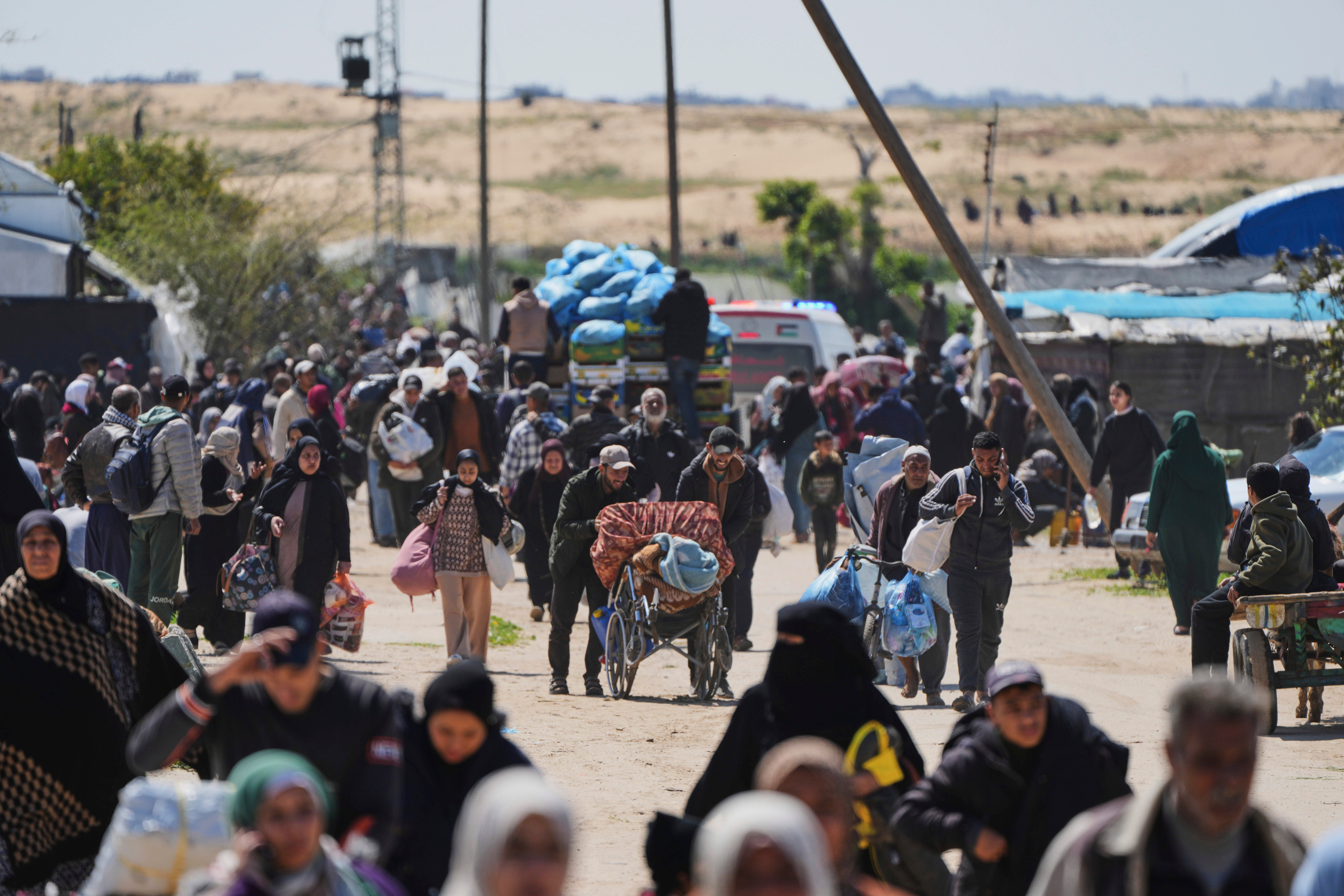 Displaced Palestinians who fled from Rafah amid ongoing Israeli military operations there arrived in Khan Younis on Sunday