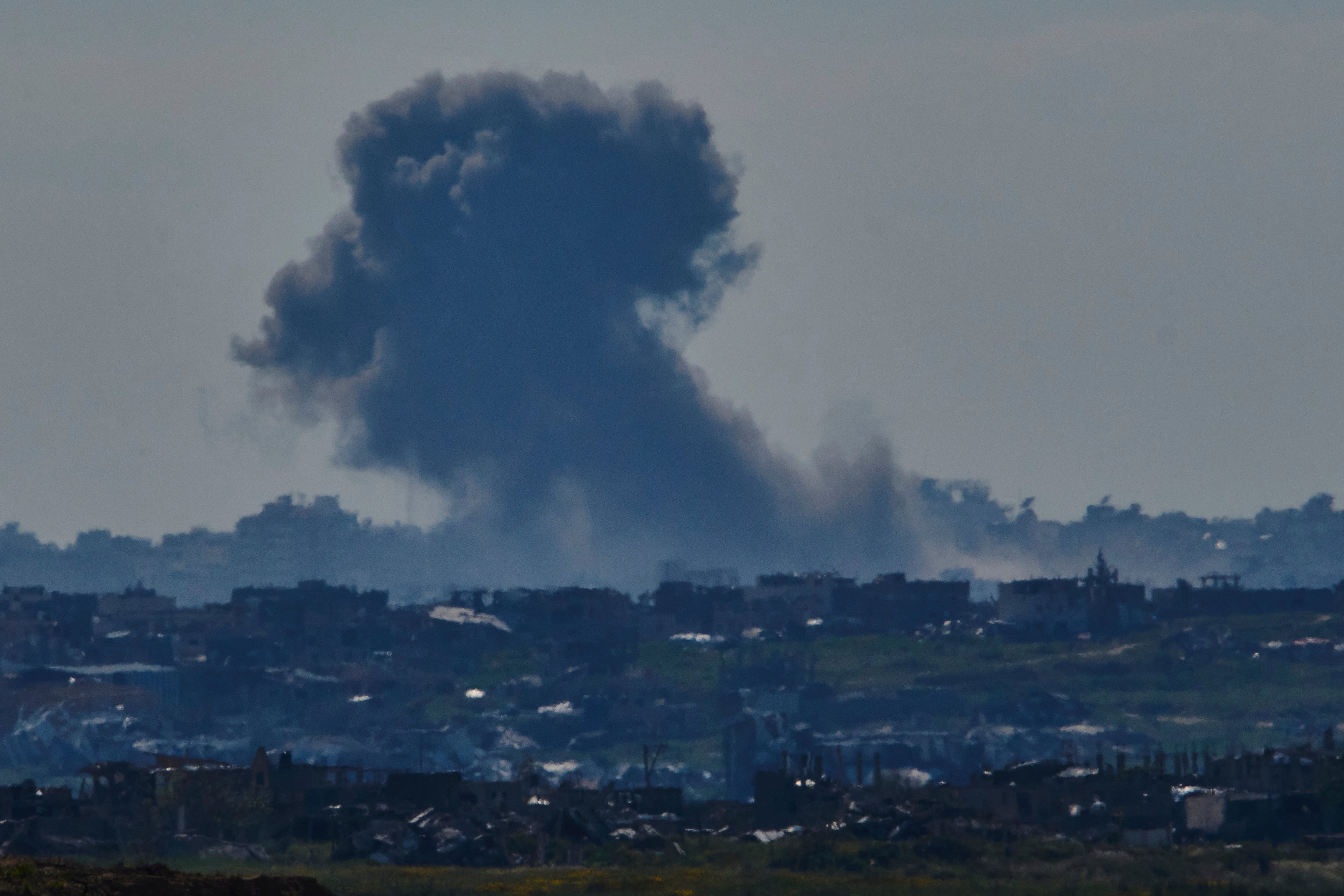 Smoke billows from the Gaza Strip following more deadly airstrikes