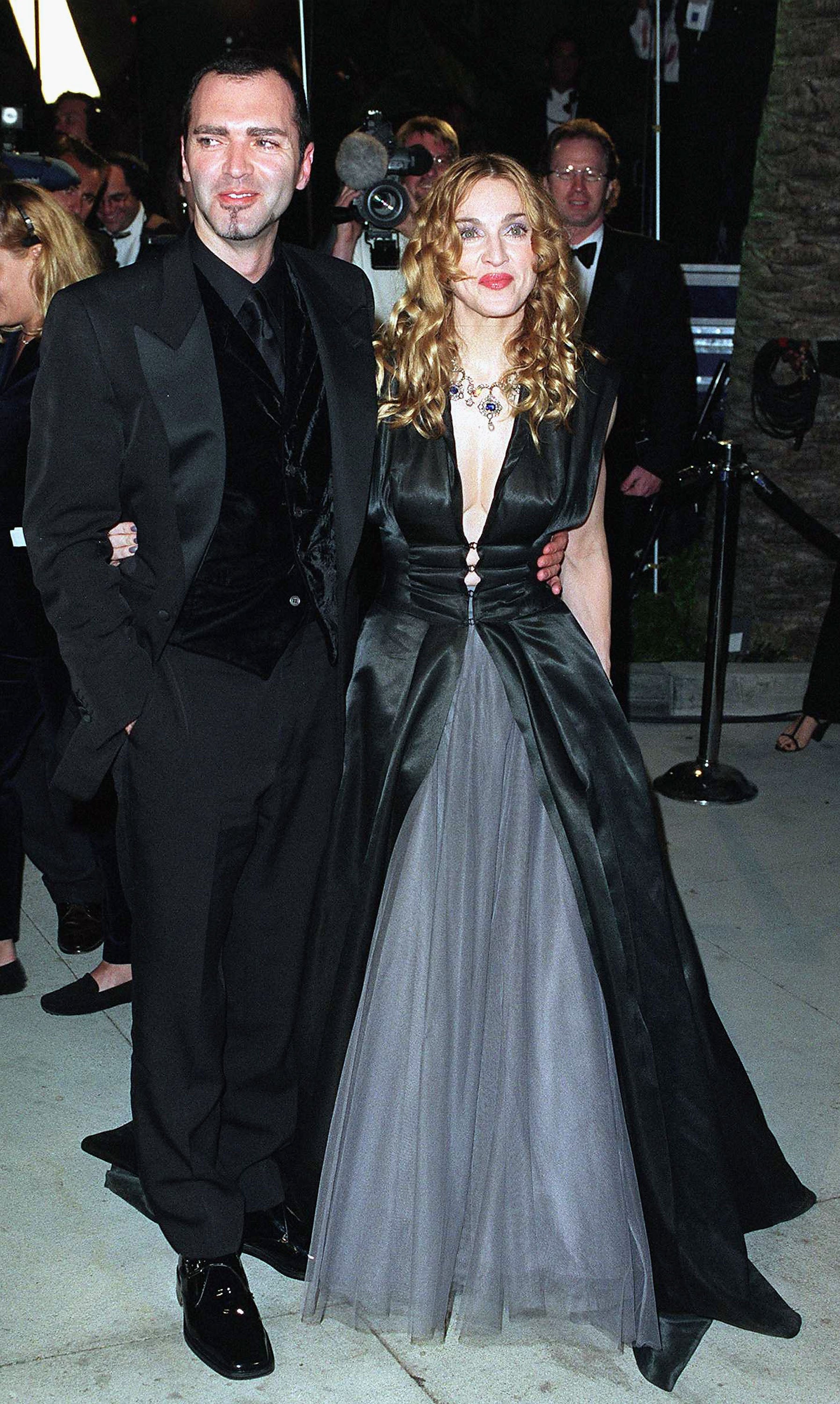 Madonna with her brother arriving at the Vanity Fair Oscars party on 23 March 1998