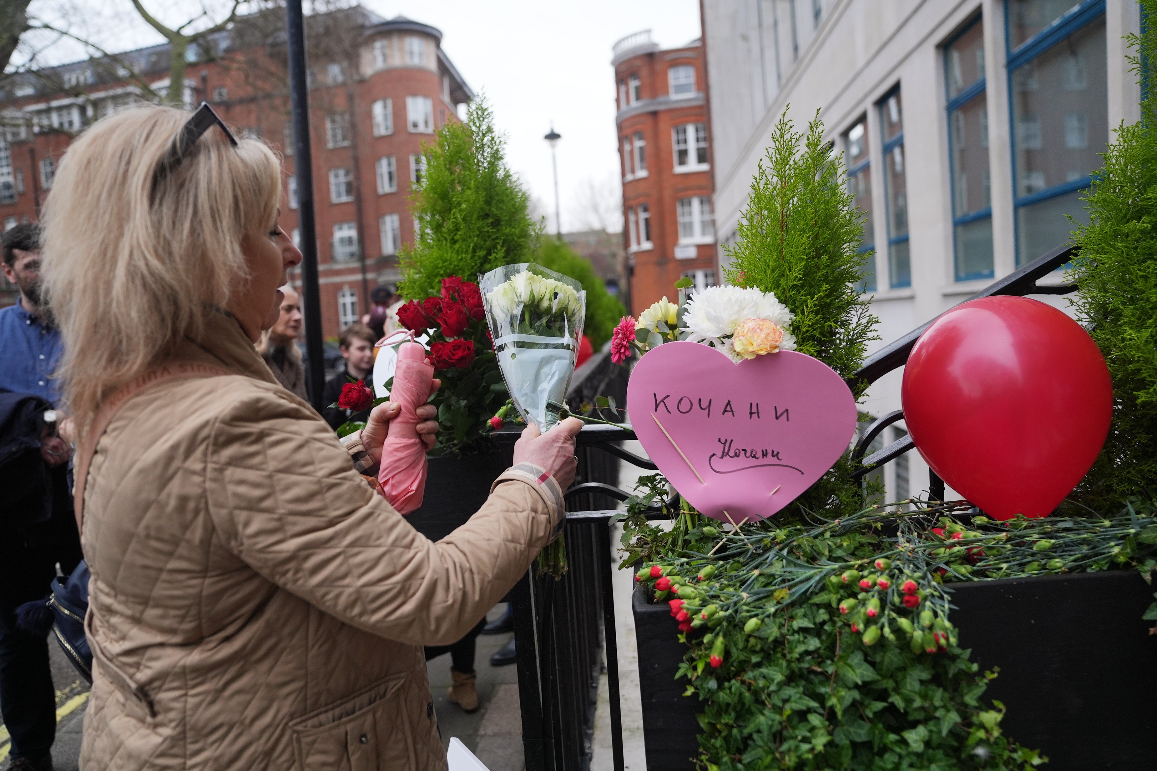 People placed tributes to the victims (Yui Mok/PA)