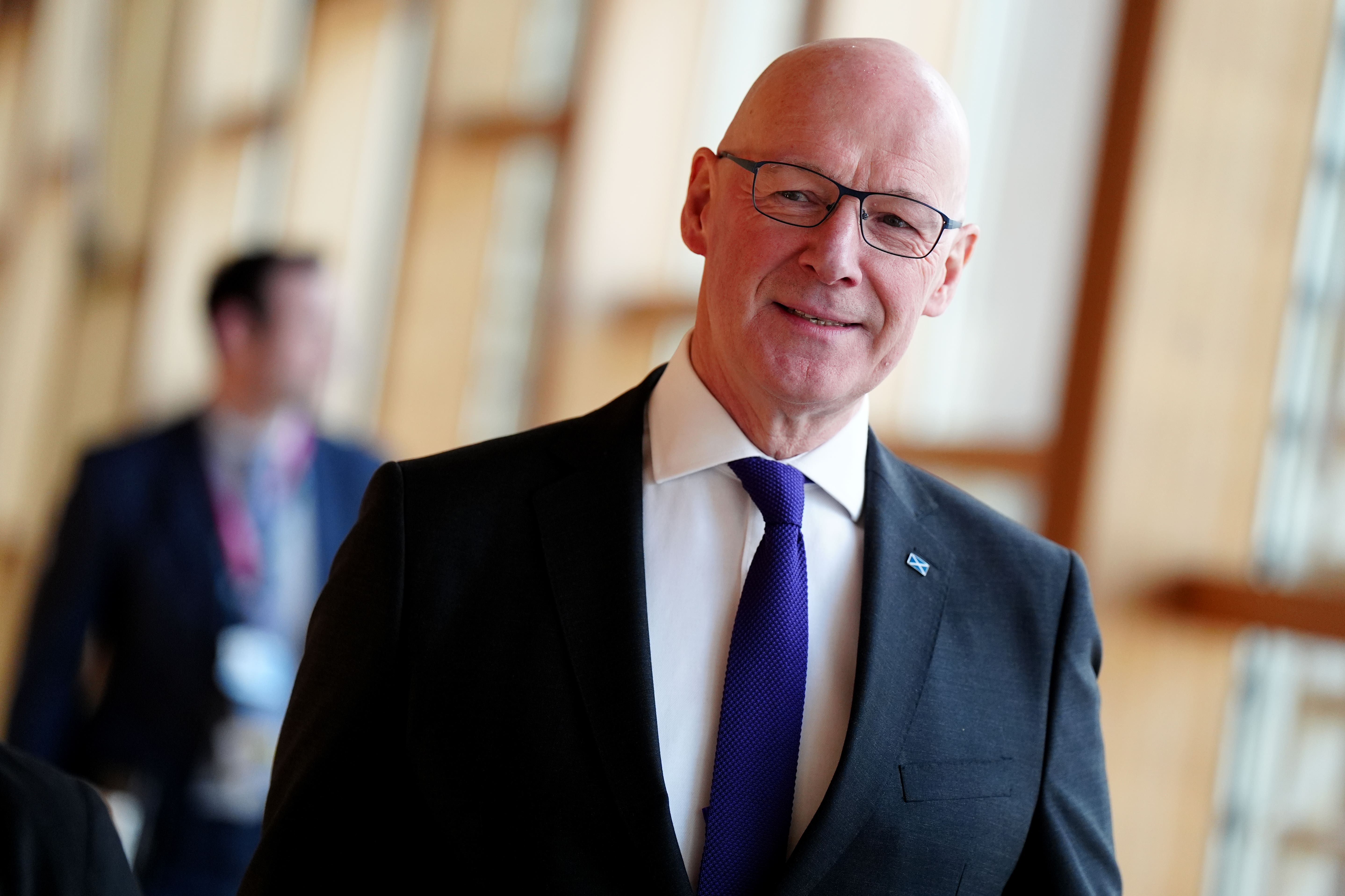John Swinney has declared the SNP is ‘back in business’ (Jane Barlow/PA)