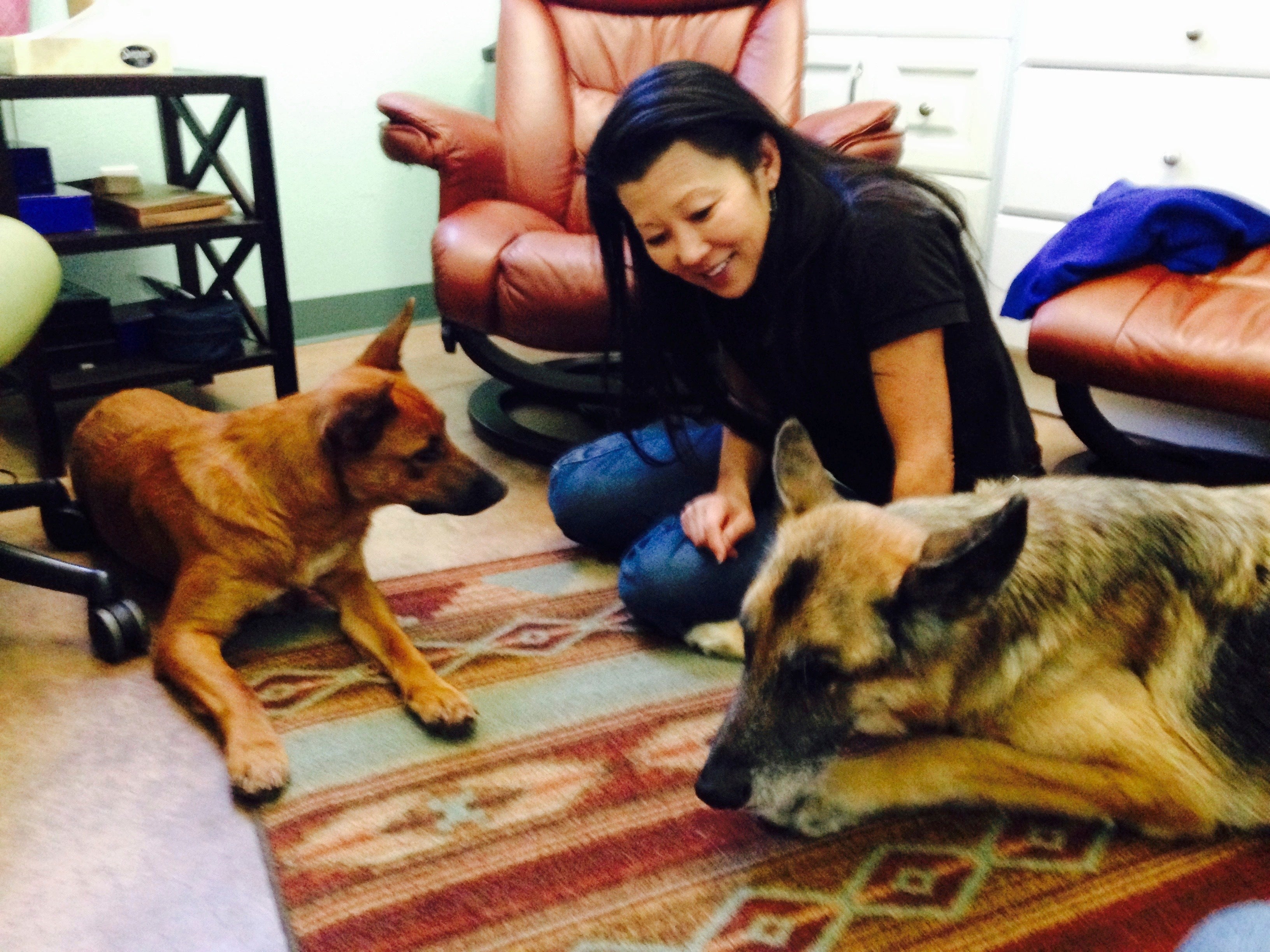 Betsy Arakawa pictured with her dogs Zinna, left, and Bear