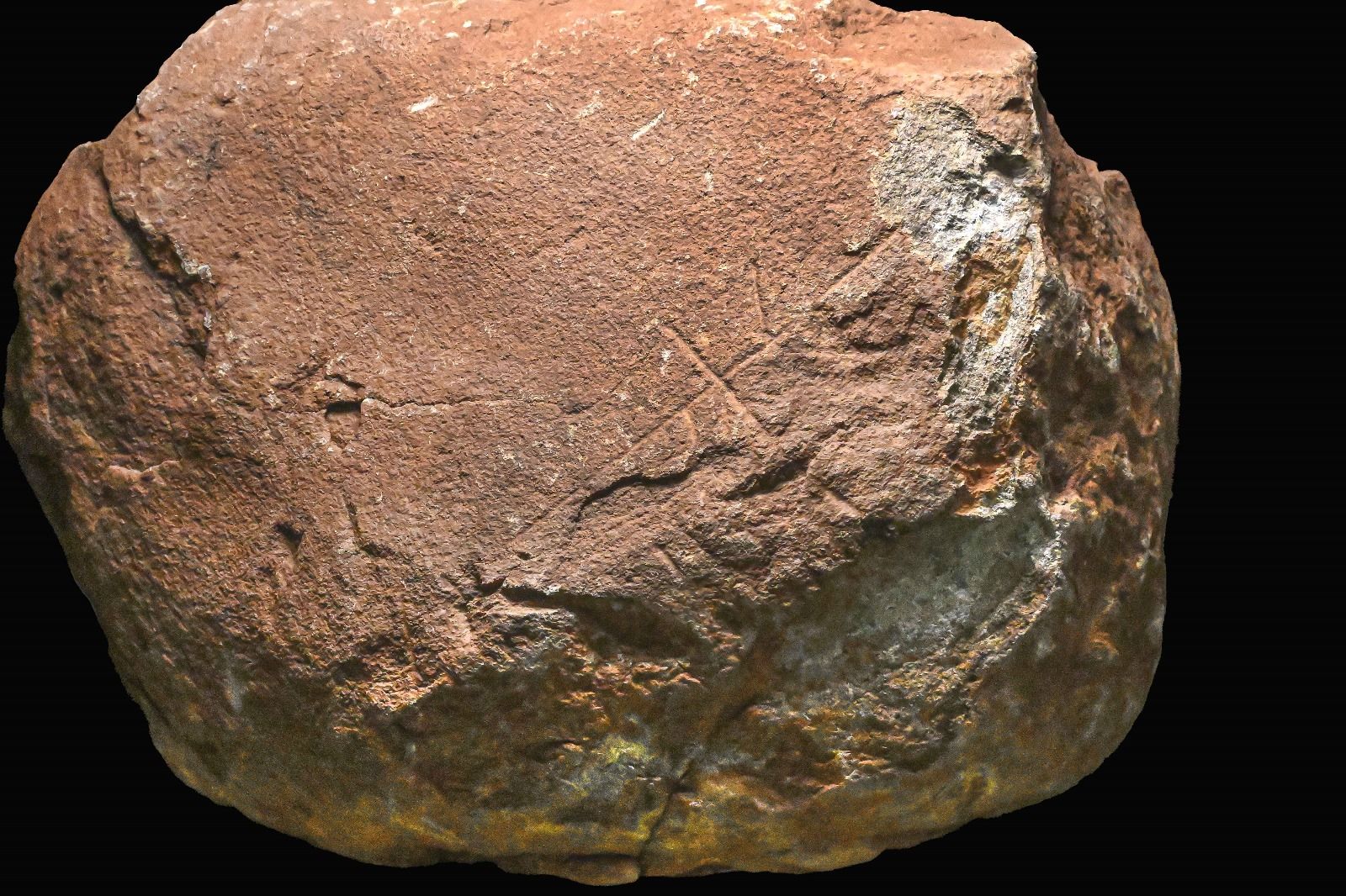 Carving on stone block could be over 200,000 years old