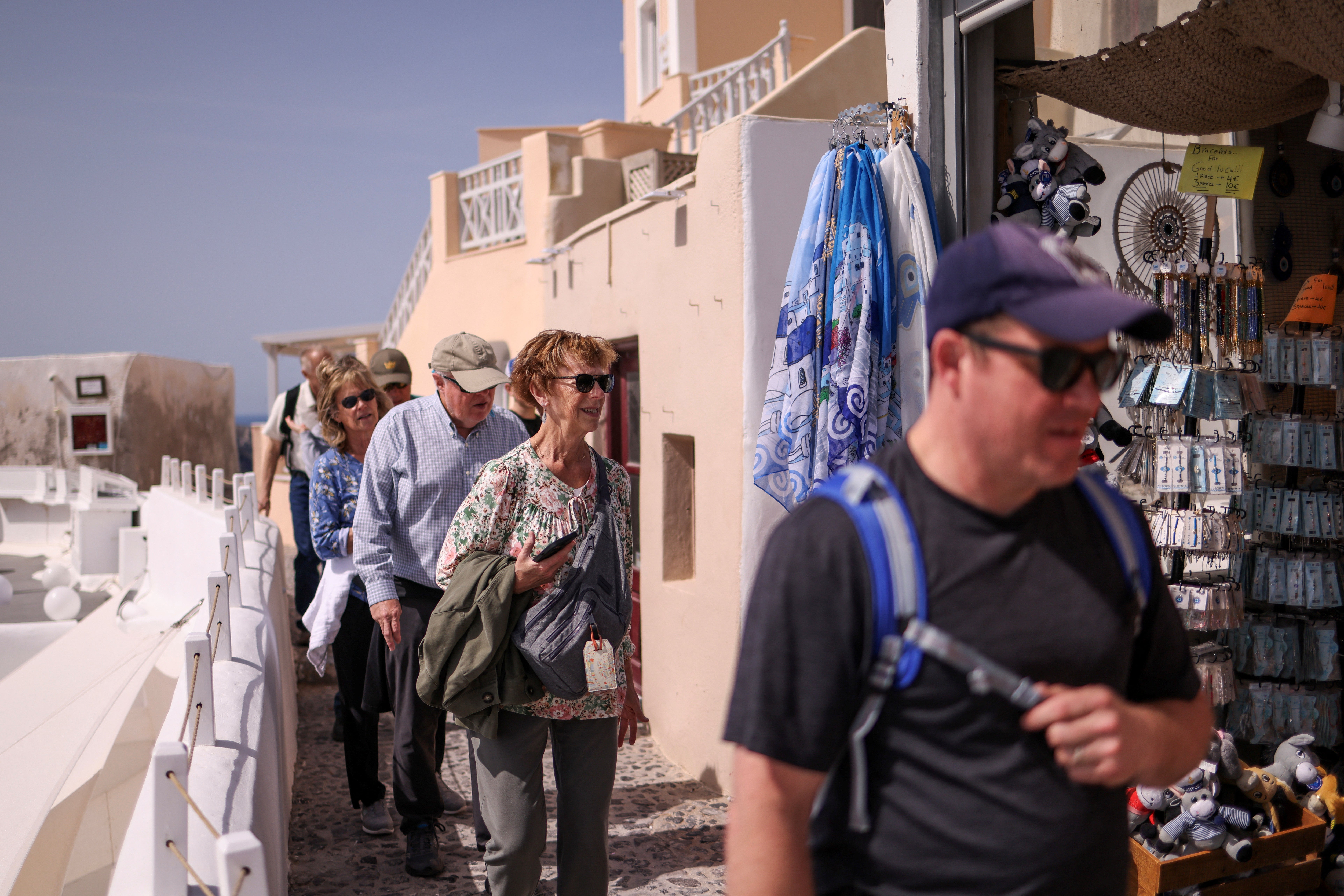 Passengers of cruise ship "Celestyal Discovery" visit the village of Oia, Santorini
