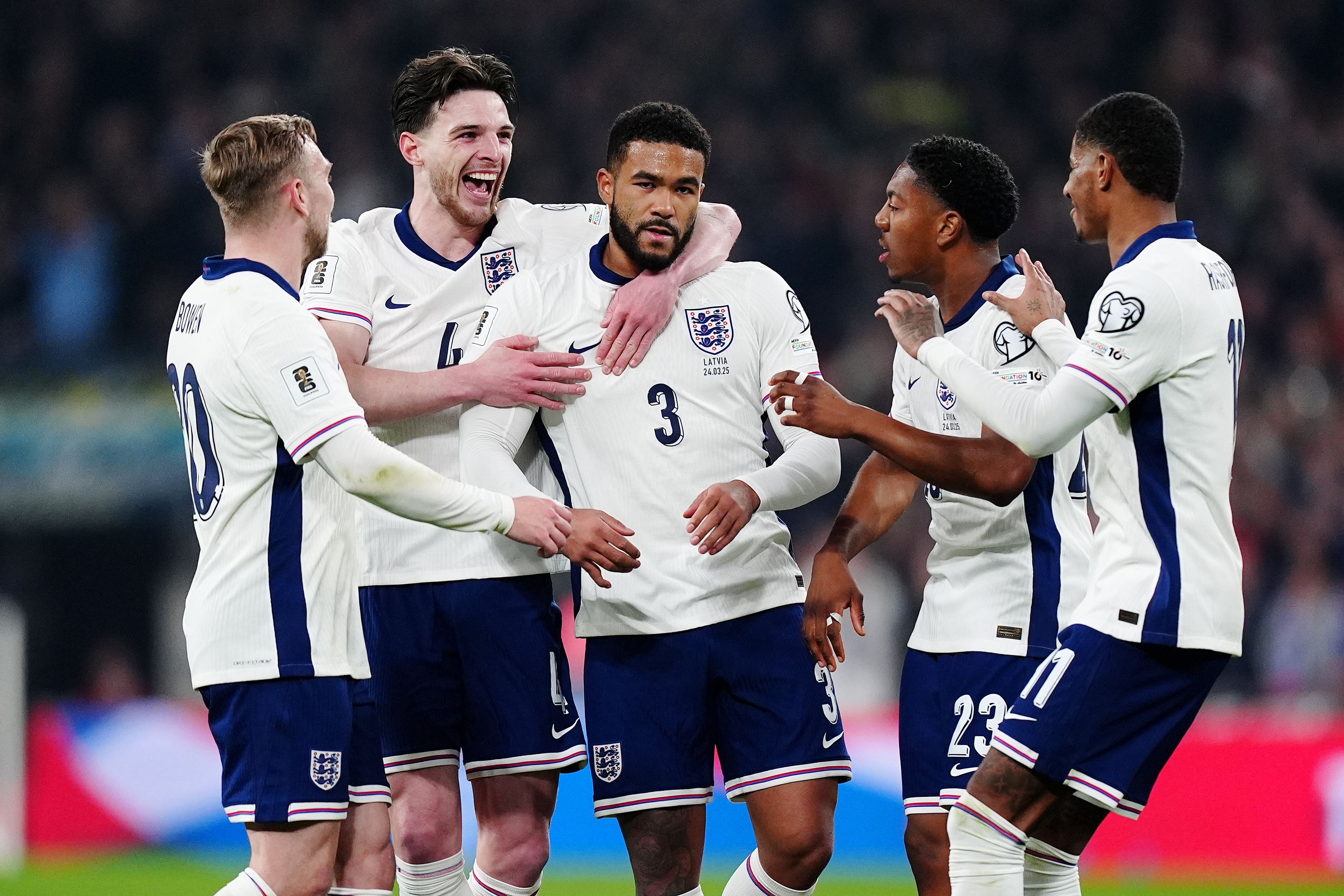 Reece James, centre, celebrates his goal against Latvia (Mike Egerton/PA)
