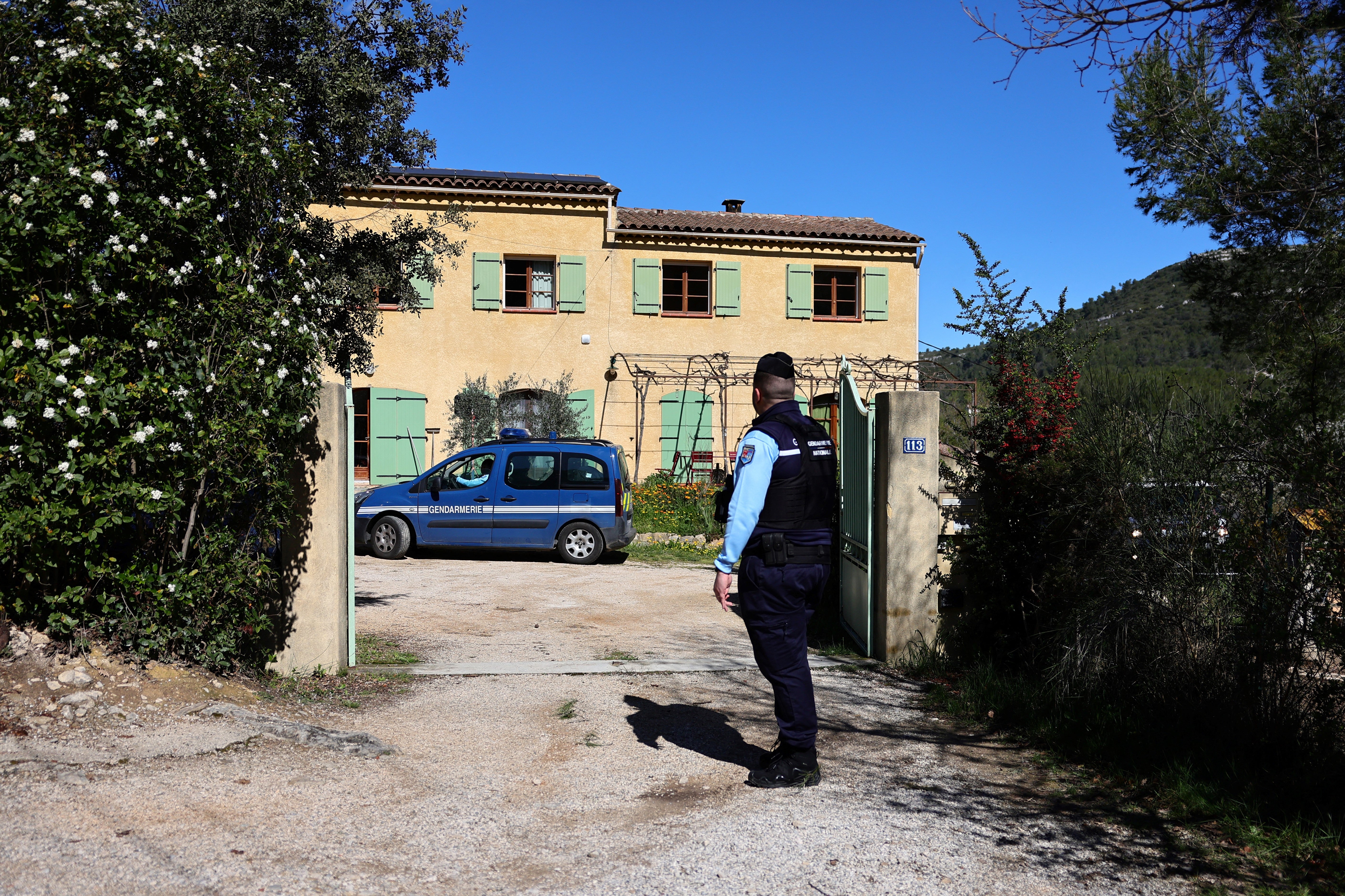 Police removed a horse trailer from the property, and were expected to seize a car as their investigation continues