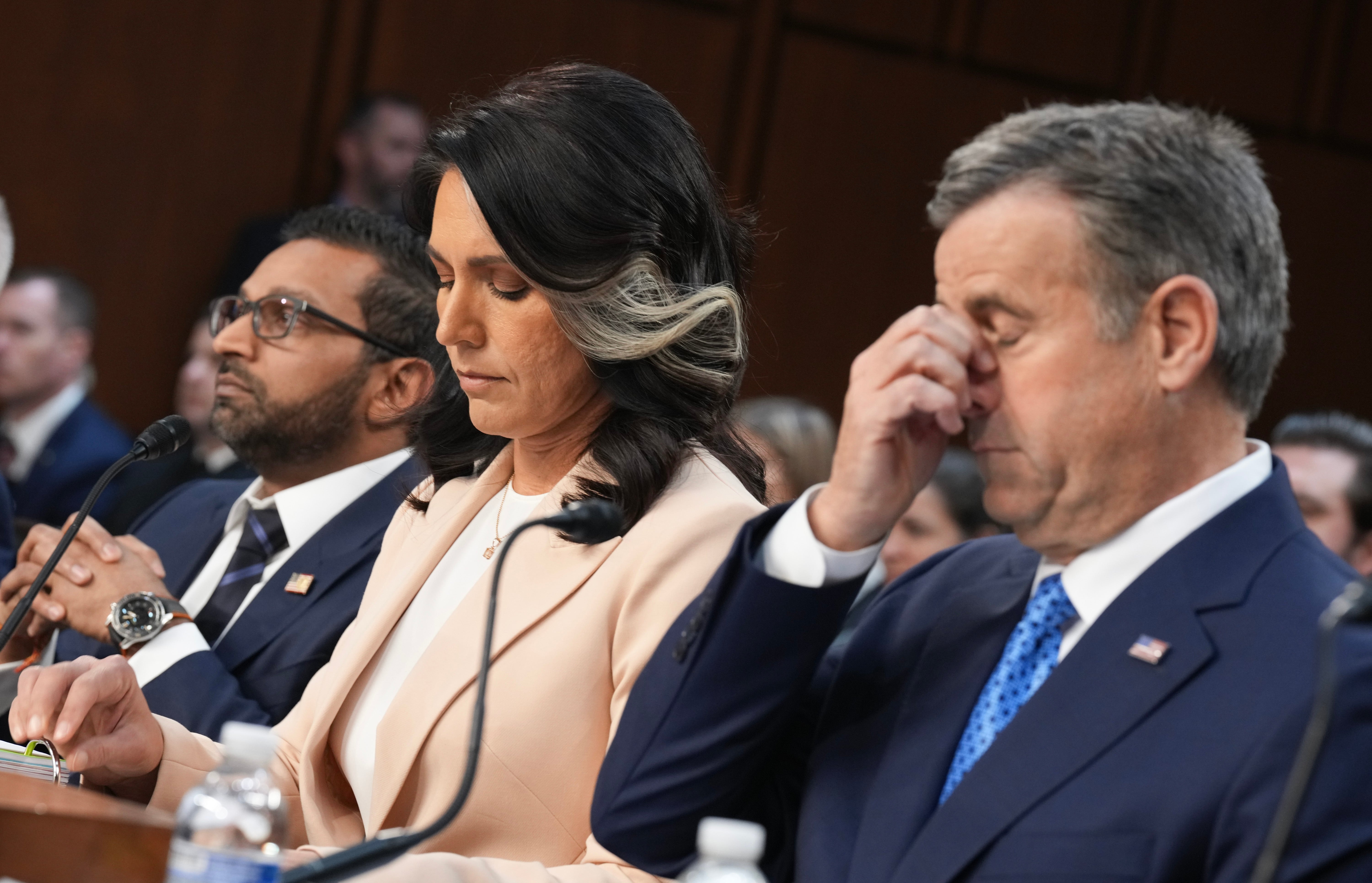 Director of National Intelligence Tulsi Gabbard, pictured with Central Intelligence Agency Director John Ratcliffe, was grilled at a Senate Committee on Intelligence Hearing Tuesday. Gabbard refused to say whether she was on the group chat