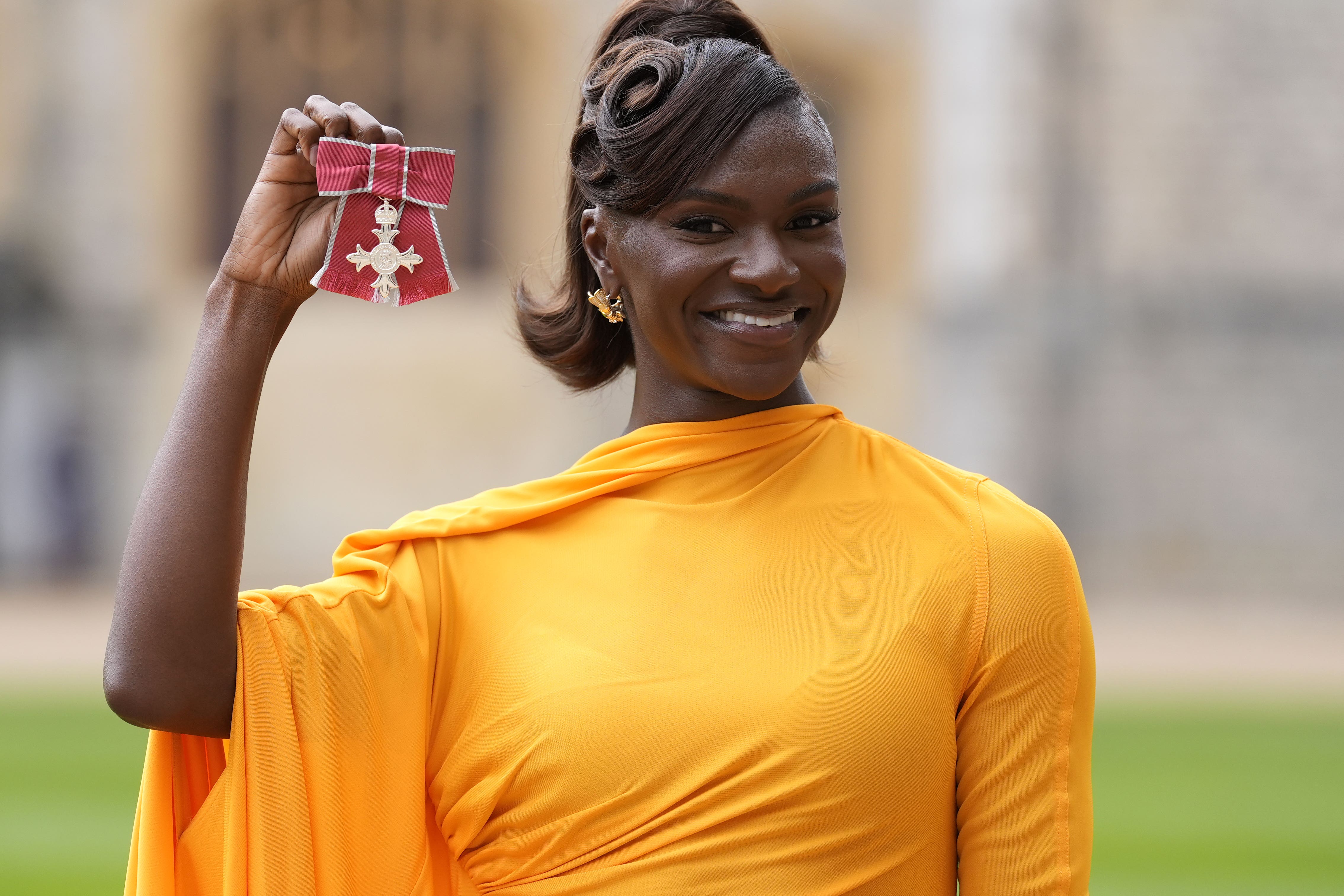 Dina Asher-Smith collected her MBE from the King at a ceremony at Windsor Castle on Tuesday (Andrew Matthews/PA)