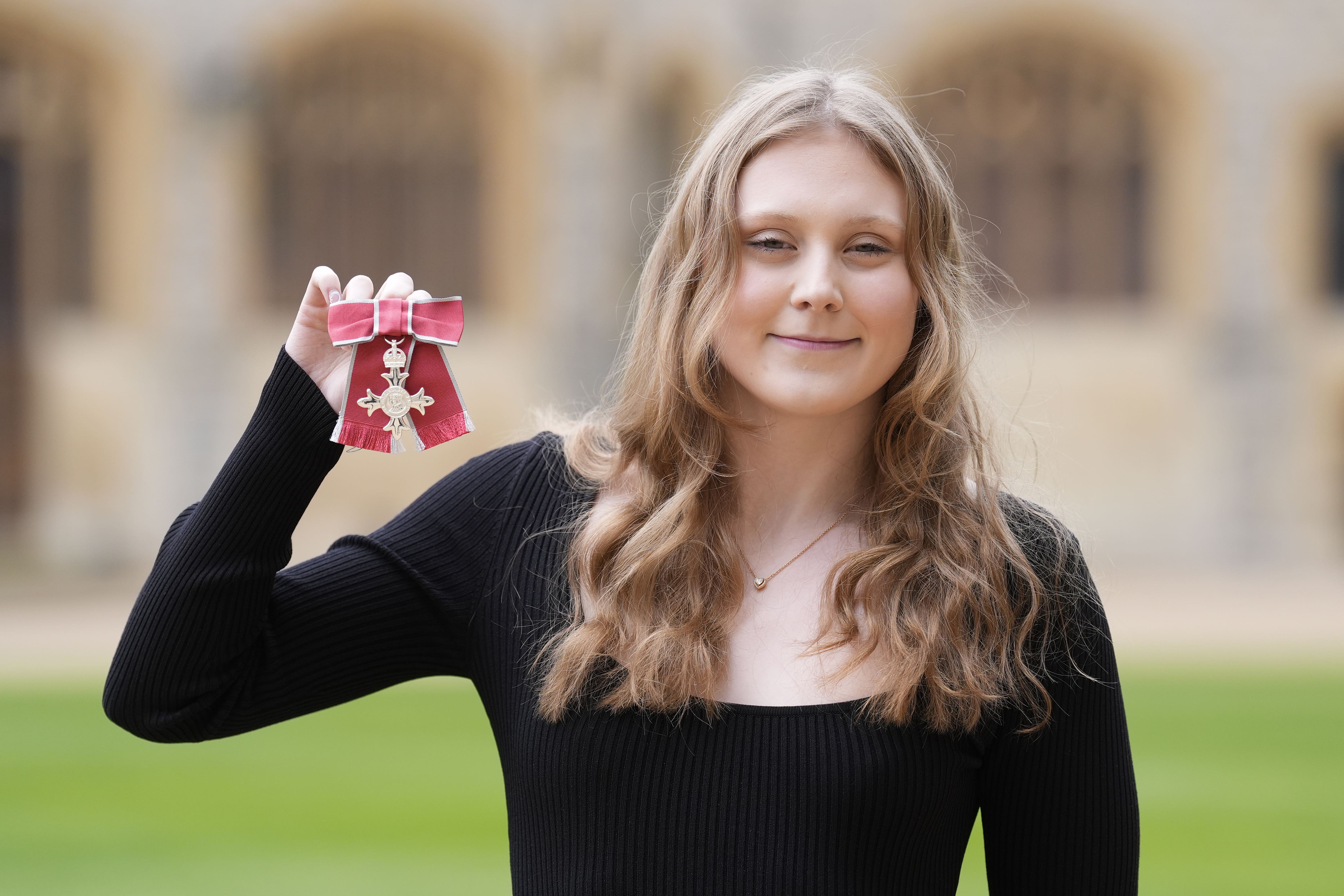 Poppy Maskill after being made a Member of the Order of the British Empire by the King at an investiture ceremony at Windsor Castle, Berkshire (Andrew Matthews/PA)