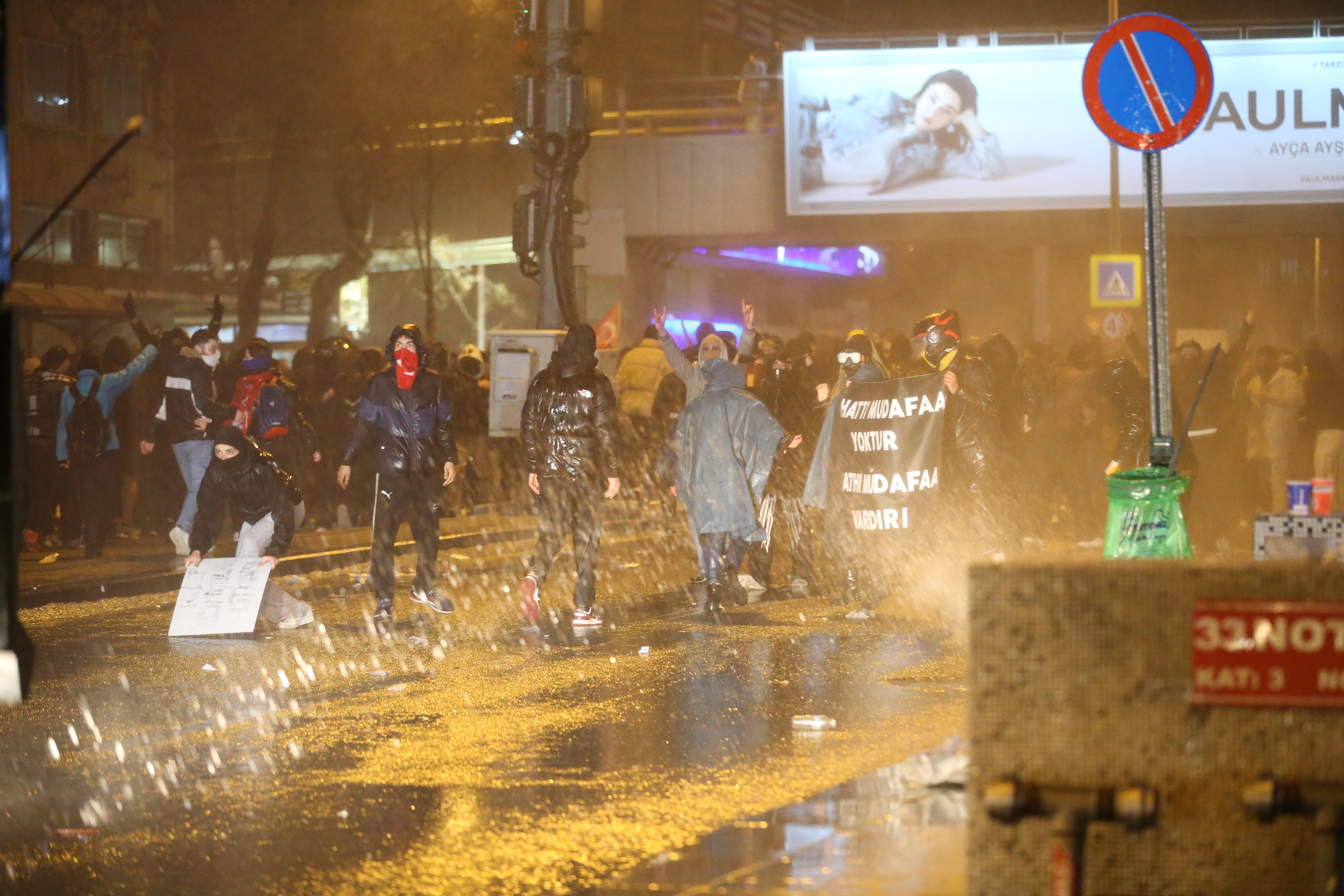 Riot police use water cannon to disperse protesters in Ankara