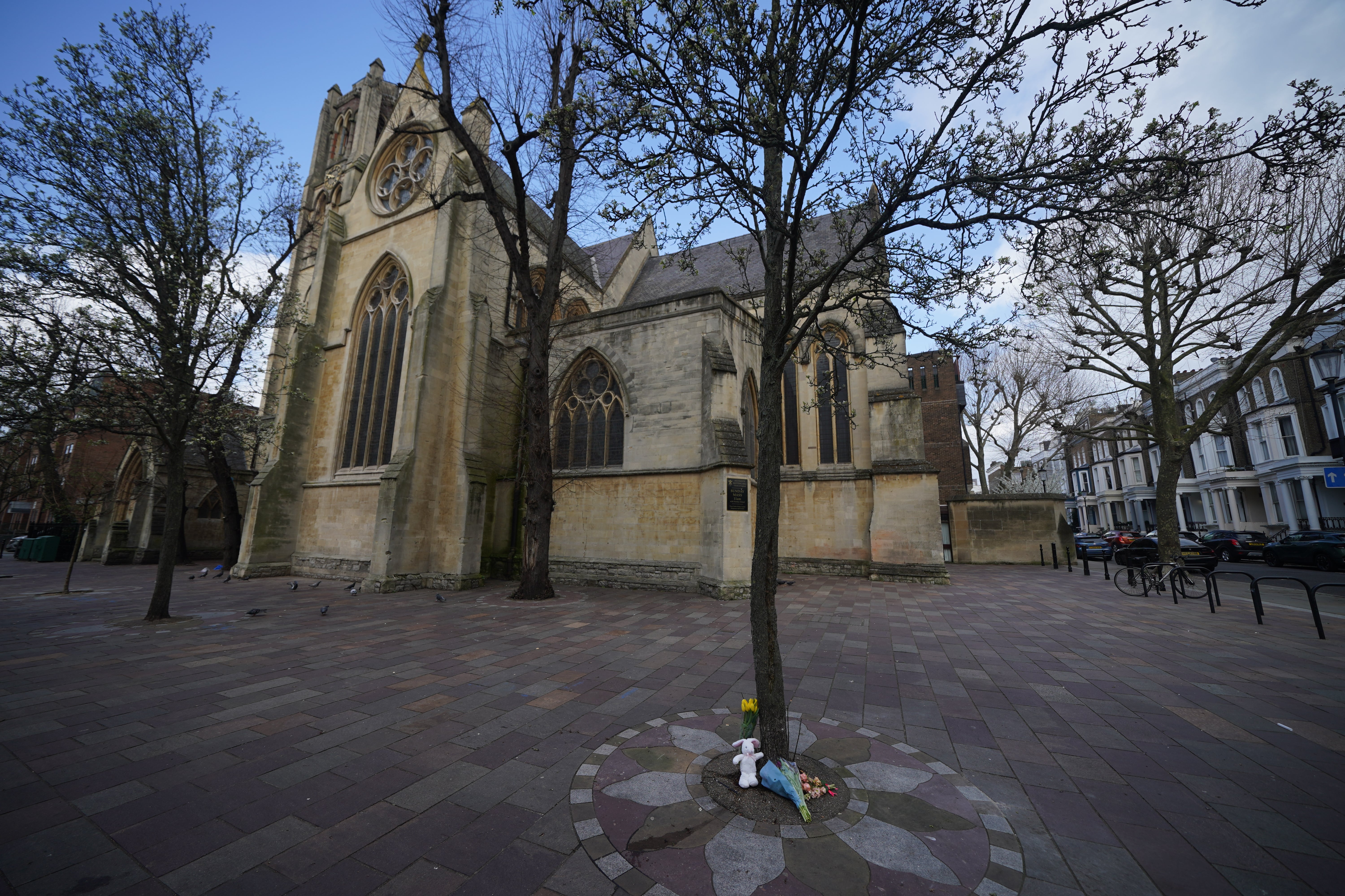 Tributes outside All Saints' Church in Notting Hill, west London