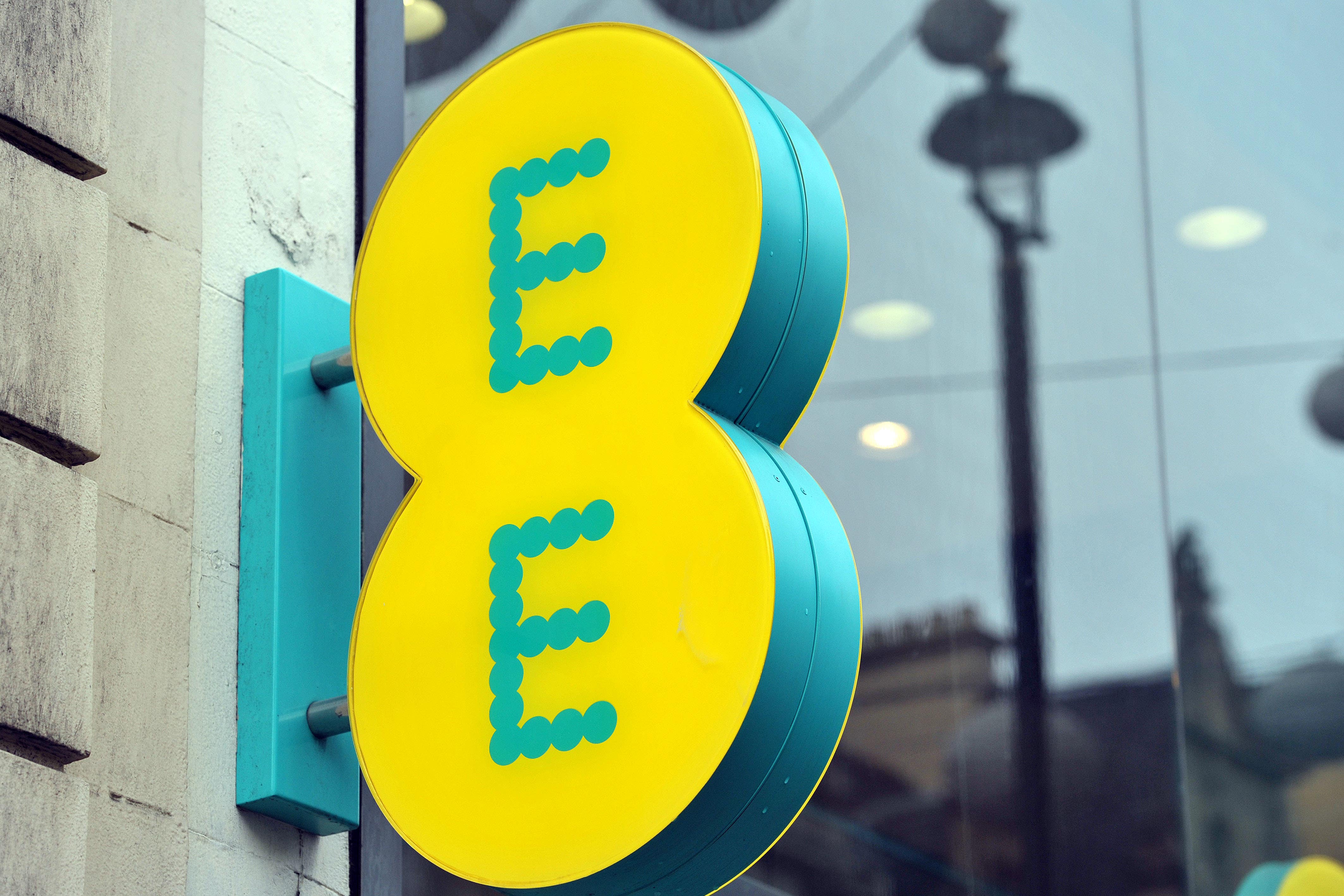 A shop sign for EE mobile in central London (PA)
