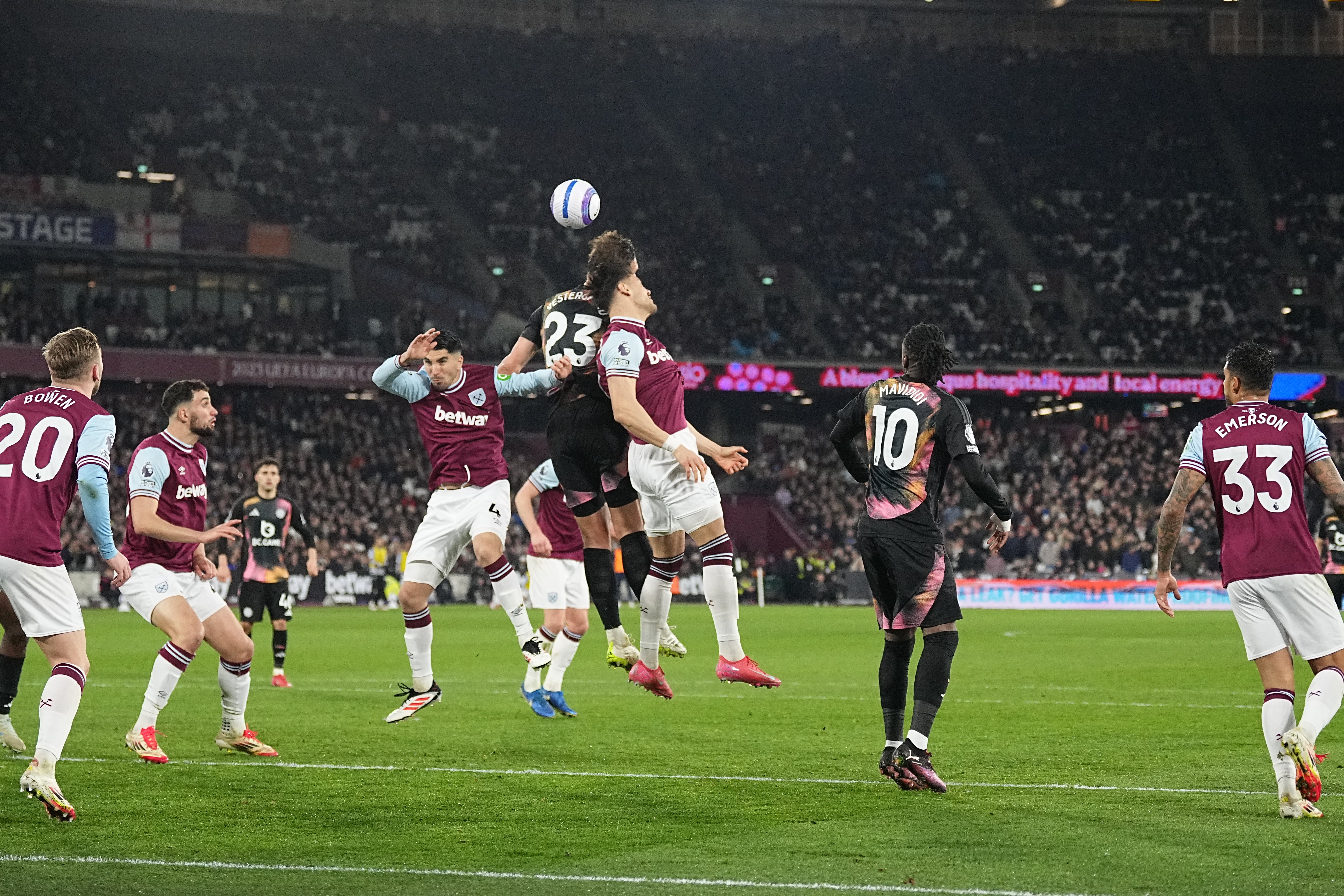 Jannik Vestergaard, of Leicester, wins a header at a corner