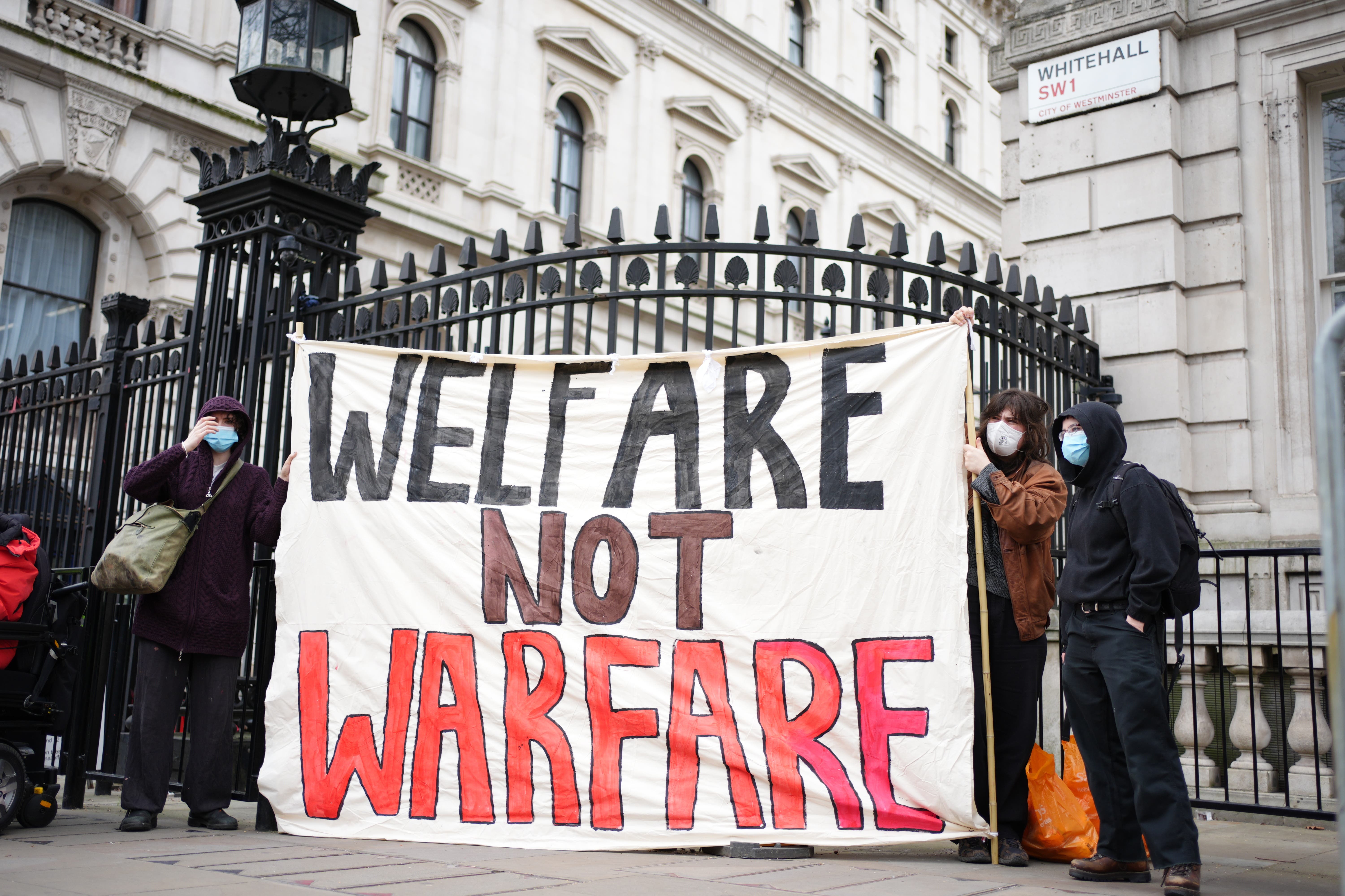 Protesters gathered on Whitehall ahead of the spring statement (Ben Whitley/PA)