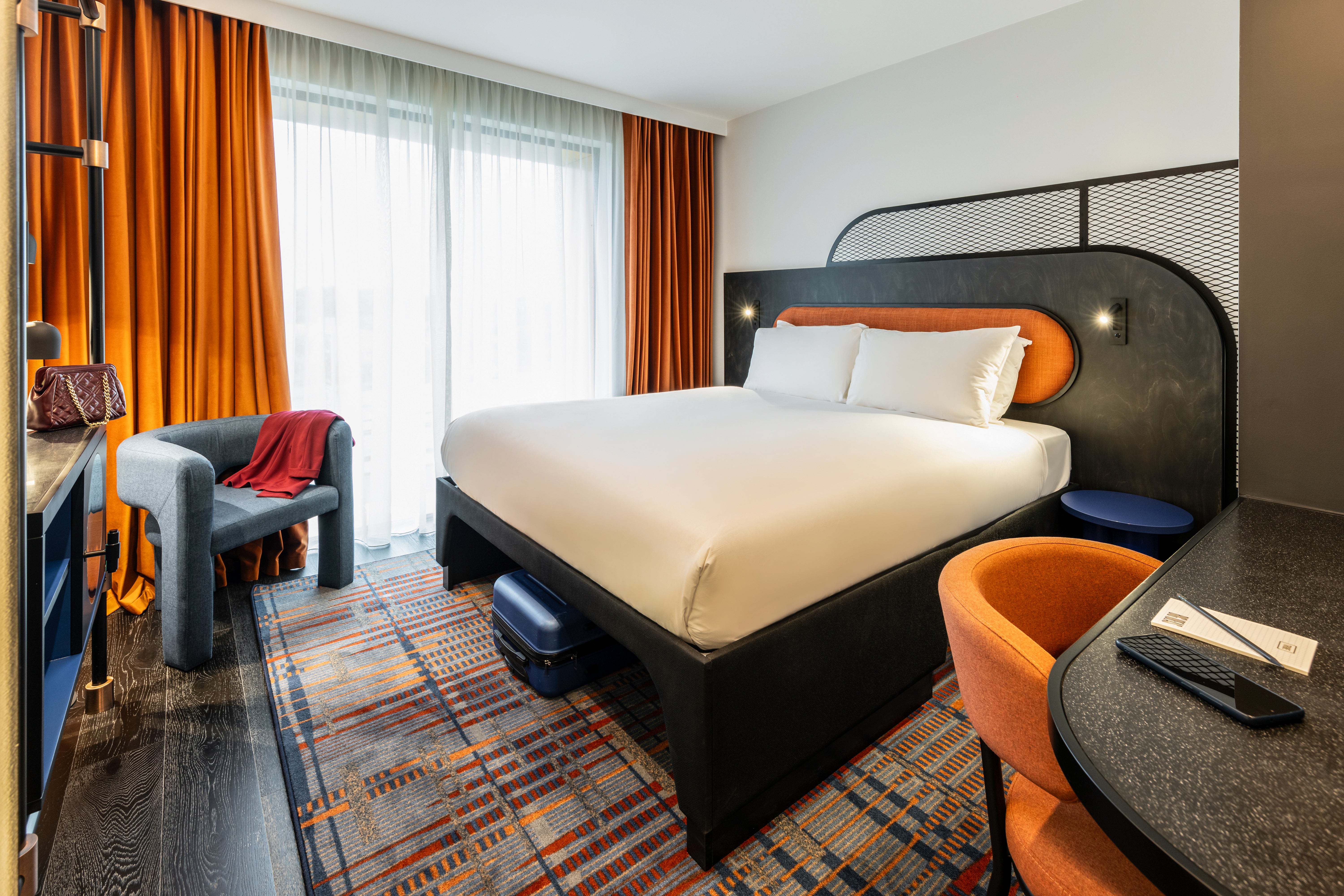 Tribe’s comfy rooms will leave you well rested by for an AM flight