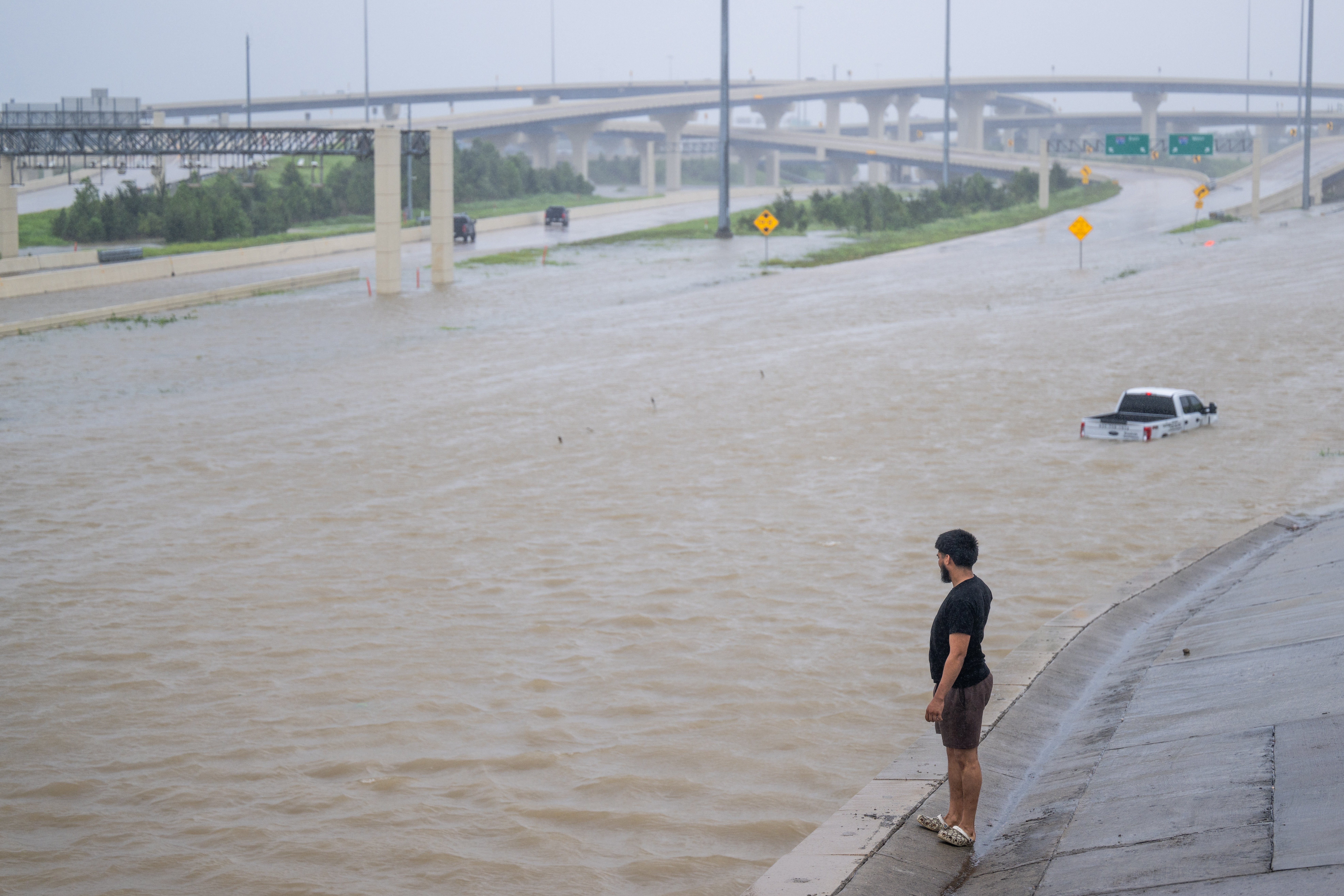 AccuWeather released its Atlantic hurricane season forecast on Wednesday. The forecasting company said this season will have ‘several similarities’ to last year. Pictured: Flooding after a storm hit Texas in July