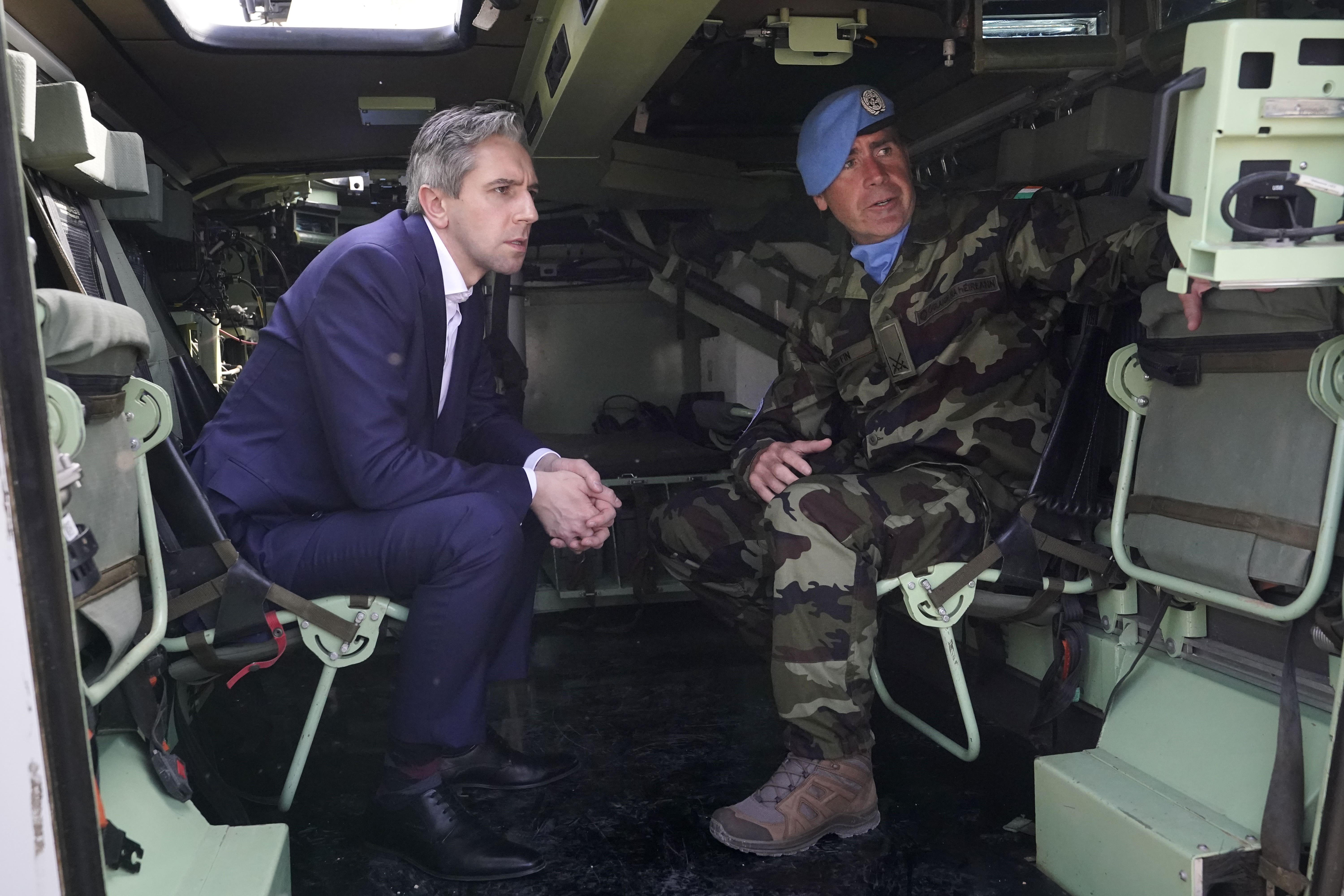 Tanaiste Simon Harris with Commandant John Griffin (Niall Carson/PA)