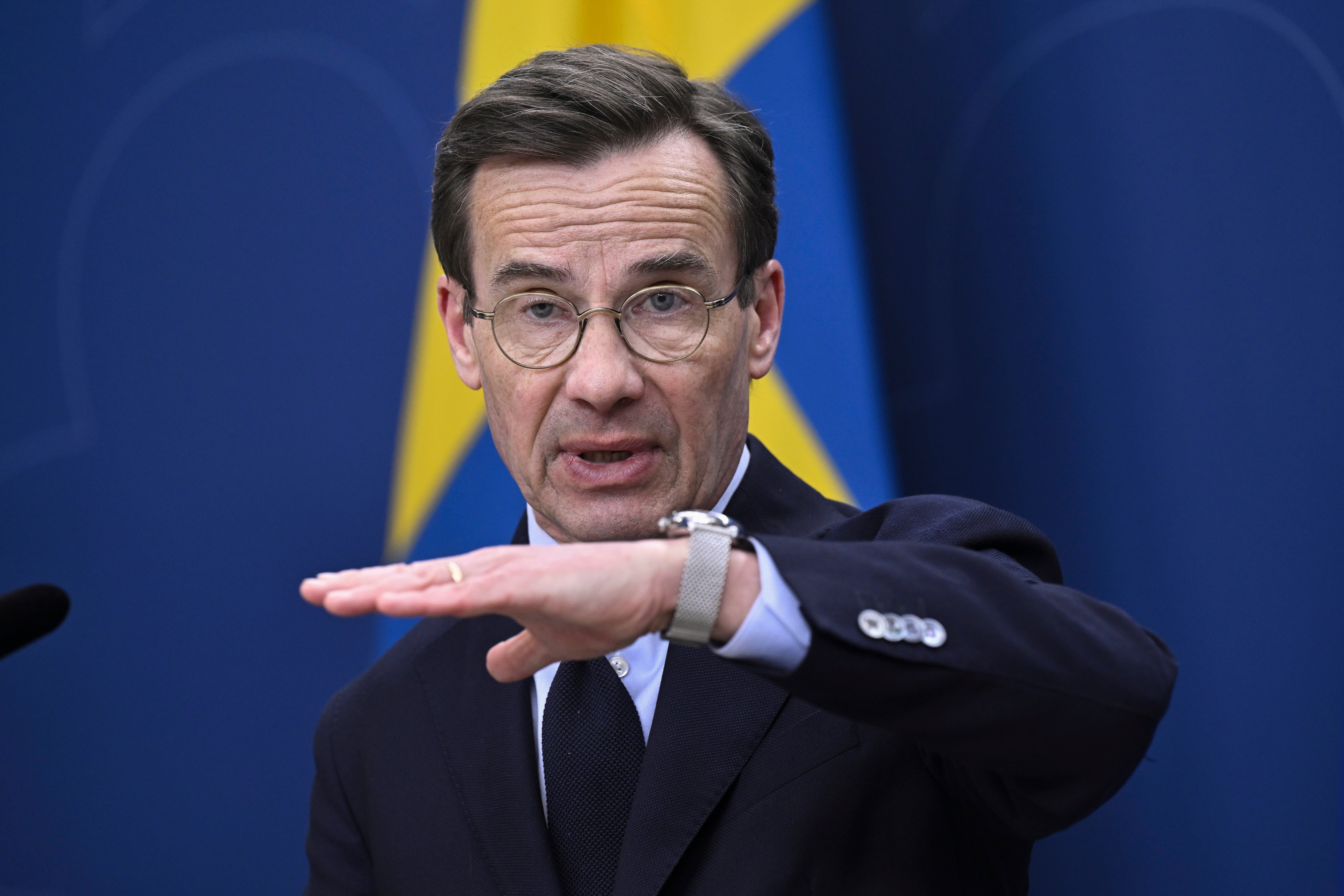 Swedish Prime Minister Ulf Kristersson announces an increase in defense spending during a press conference in Stockholm, Sweden, Wednesday, March 26, 2025.