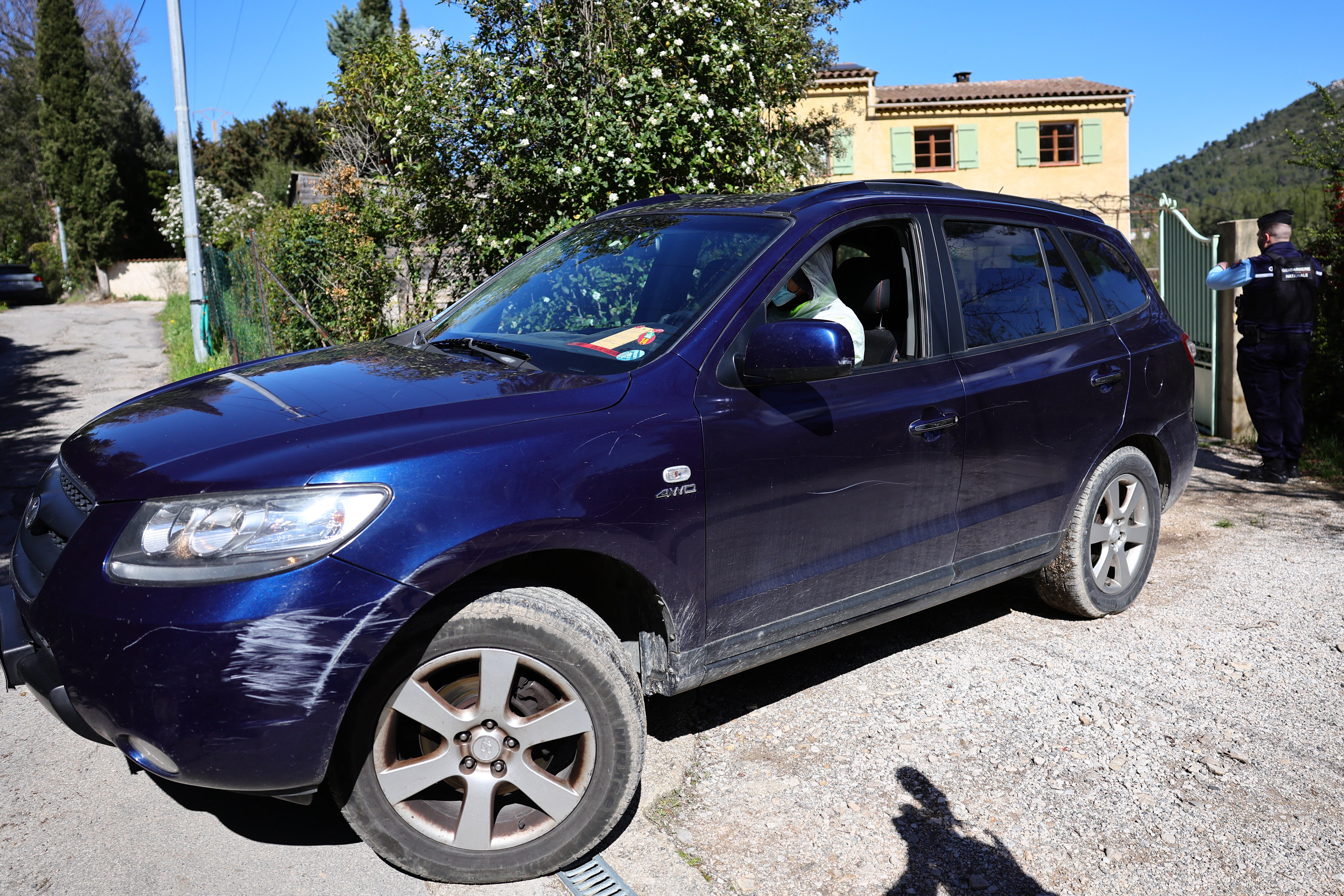 A forensic investigator drives the car of the grandfather