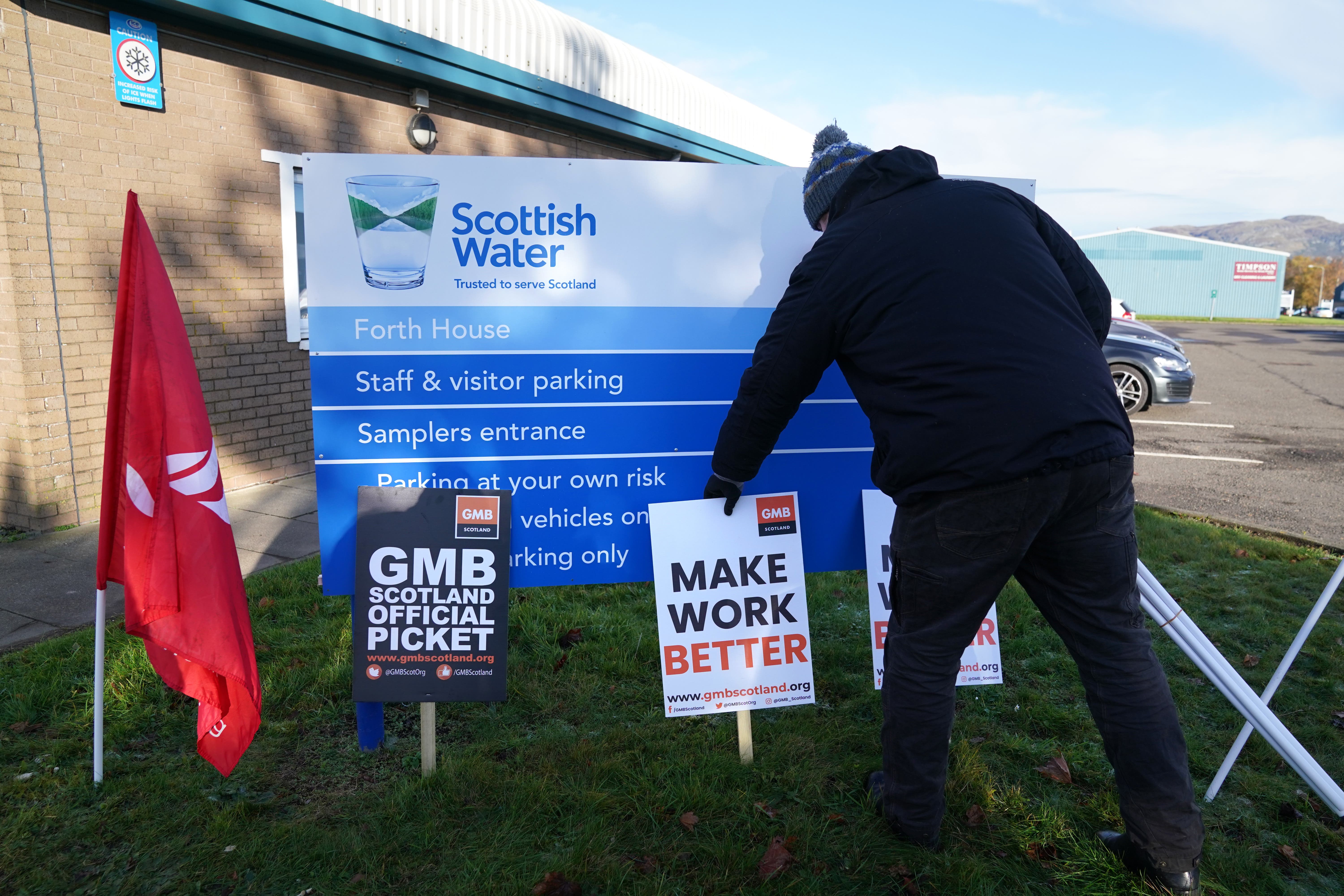 Members of Unite, Unison and GMB Scotland at Scottish Water will strike on Friday (PA)