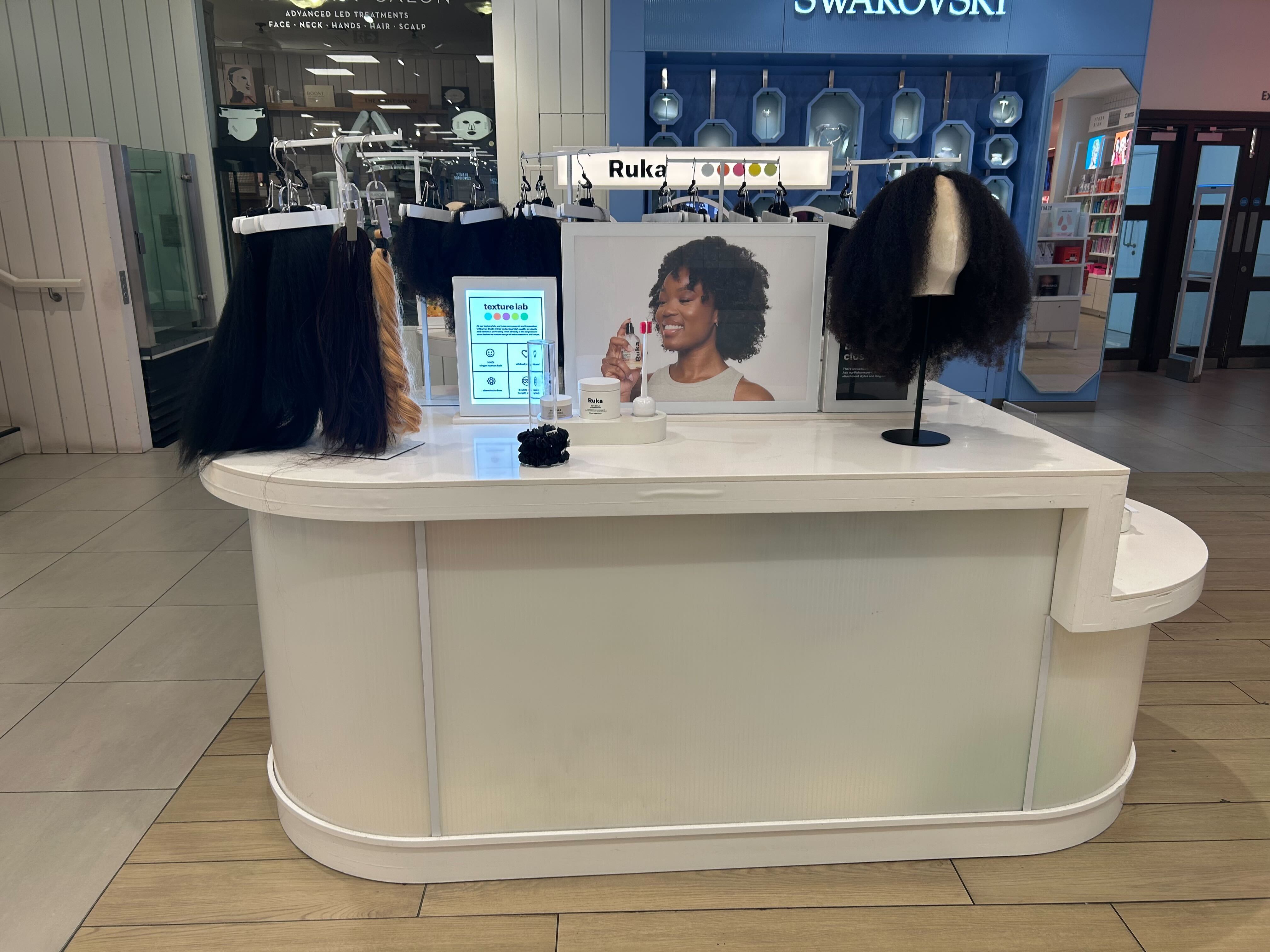 A Ruka Hair counter in a department store in London