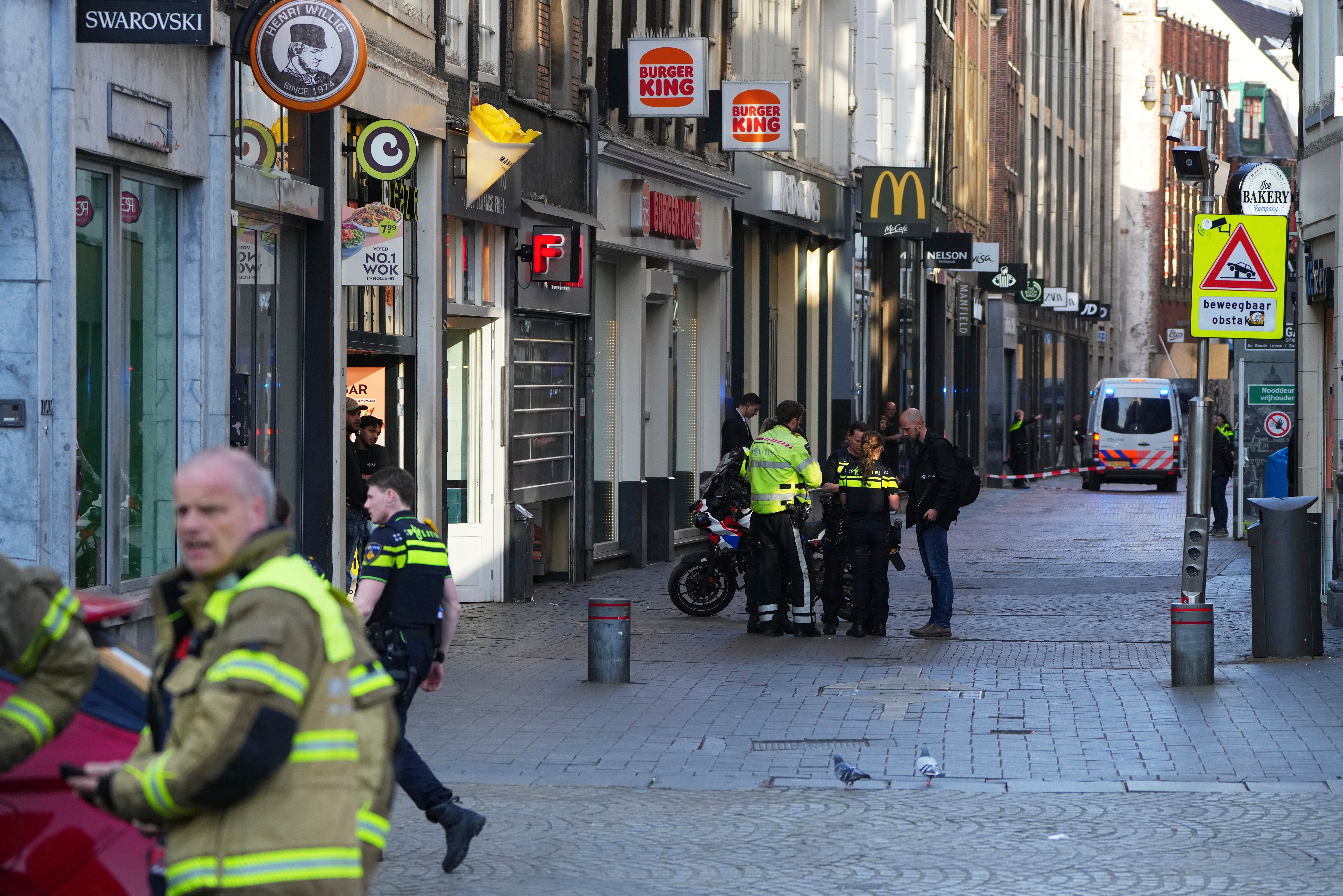 Dam Square and the surrounding streets were cordoned off following the attack to allow the police to investigate and a helicopter to land.