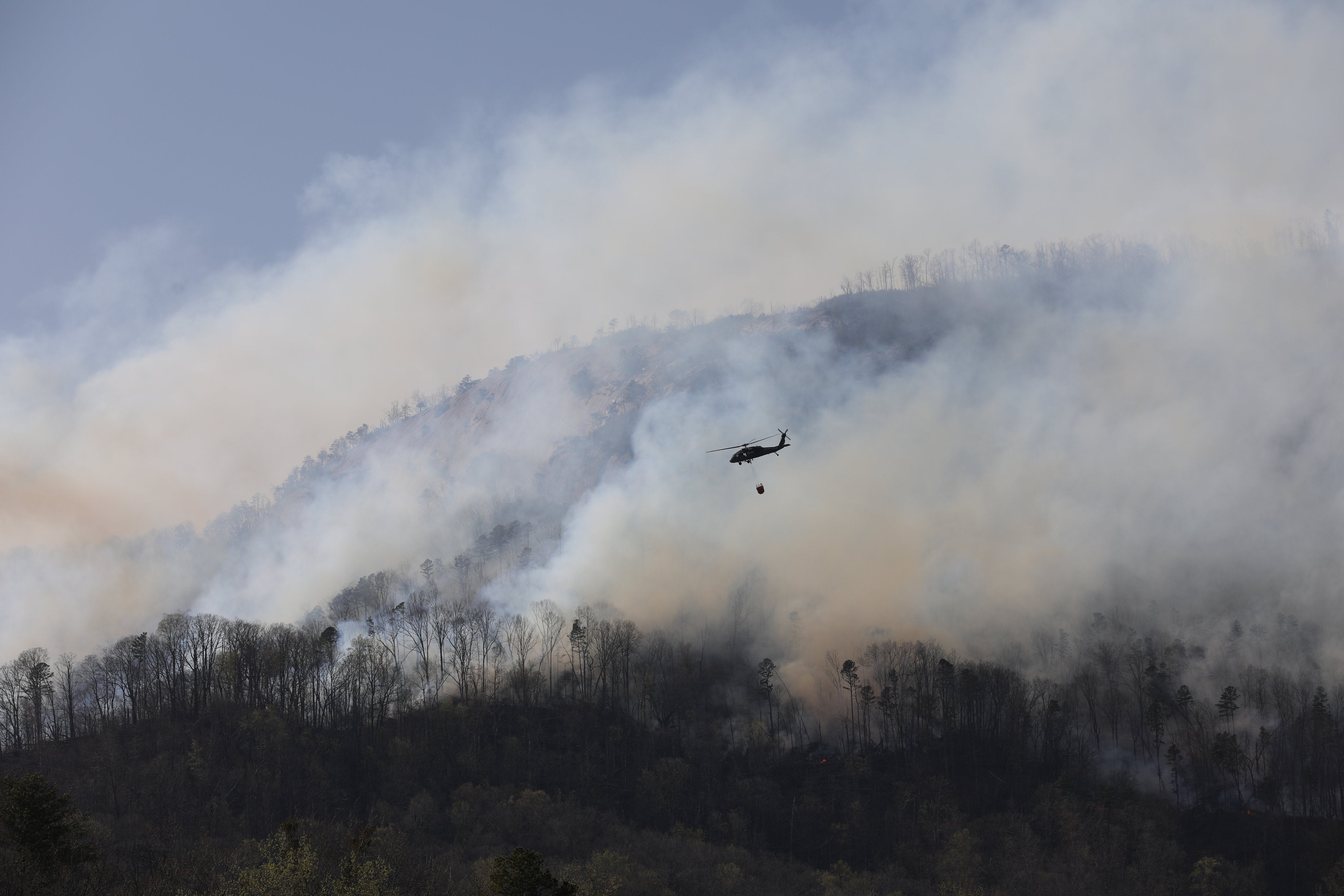 The South Carolina National Guard is working to help fight the state's wildfires. Members have completed more than 400 water drops