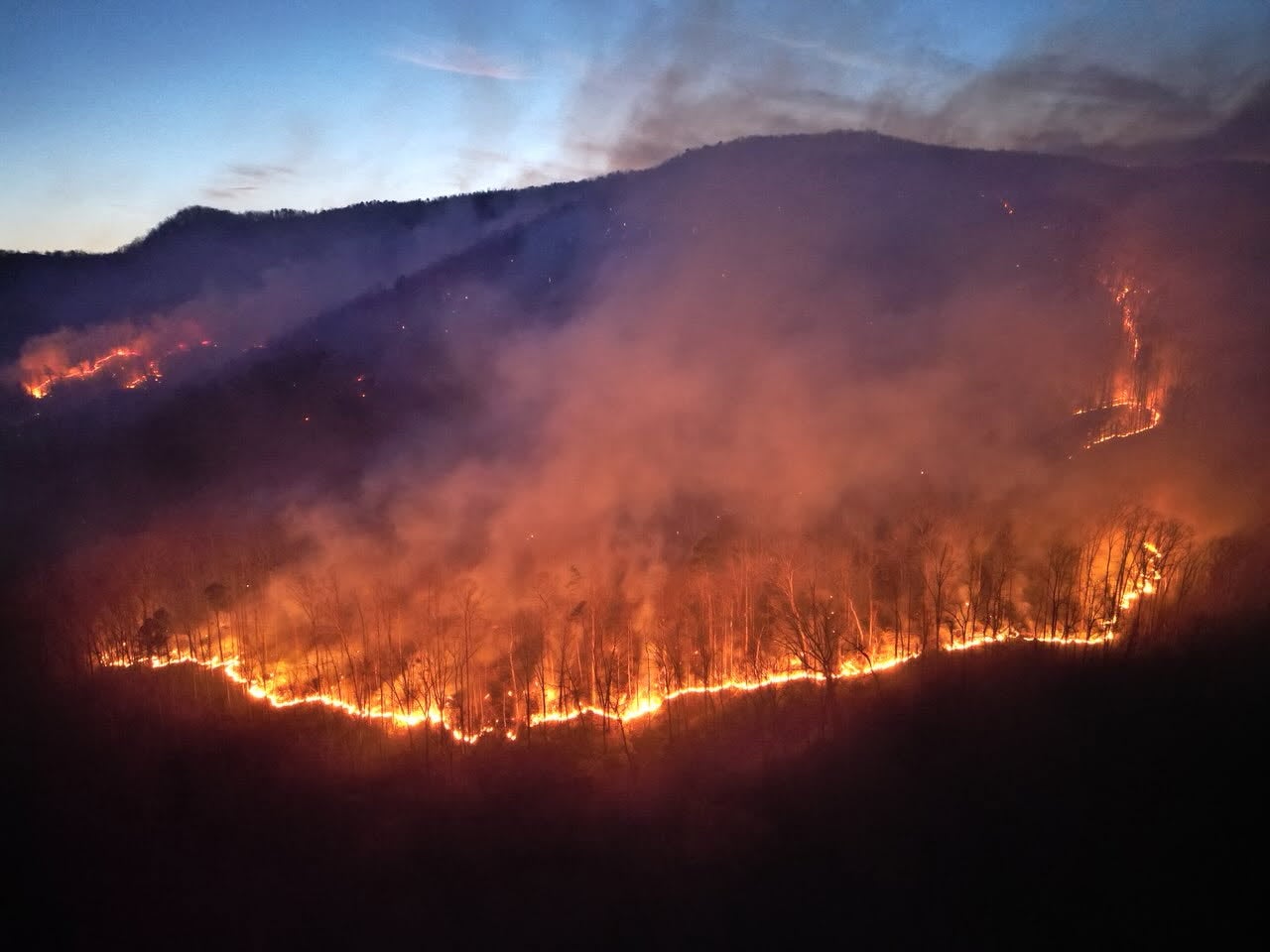 Forecasters are warning residents in the carolinas of continued fire danger. Multiple blazes in the region have scorched thousands of acres this week, including North Carolina's Polk County