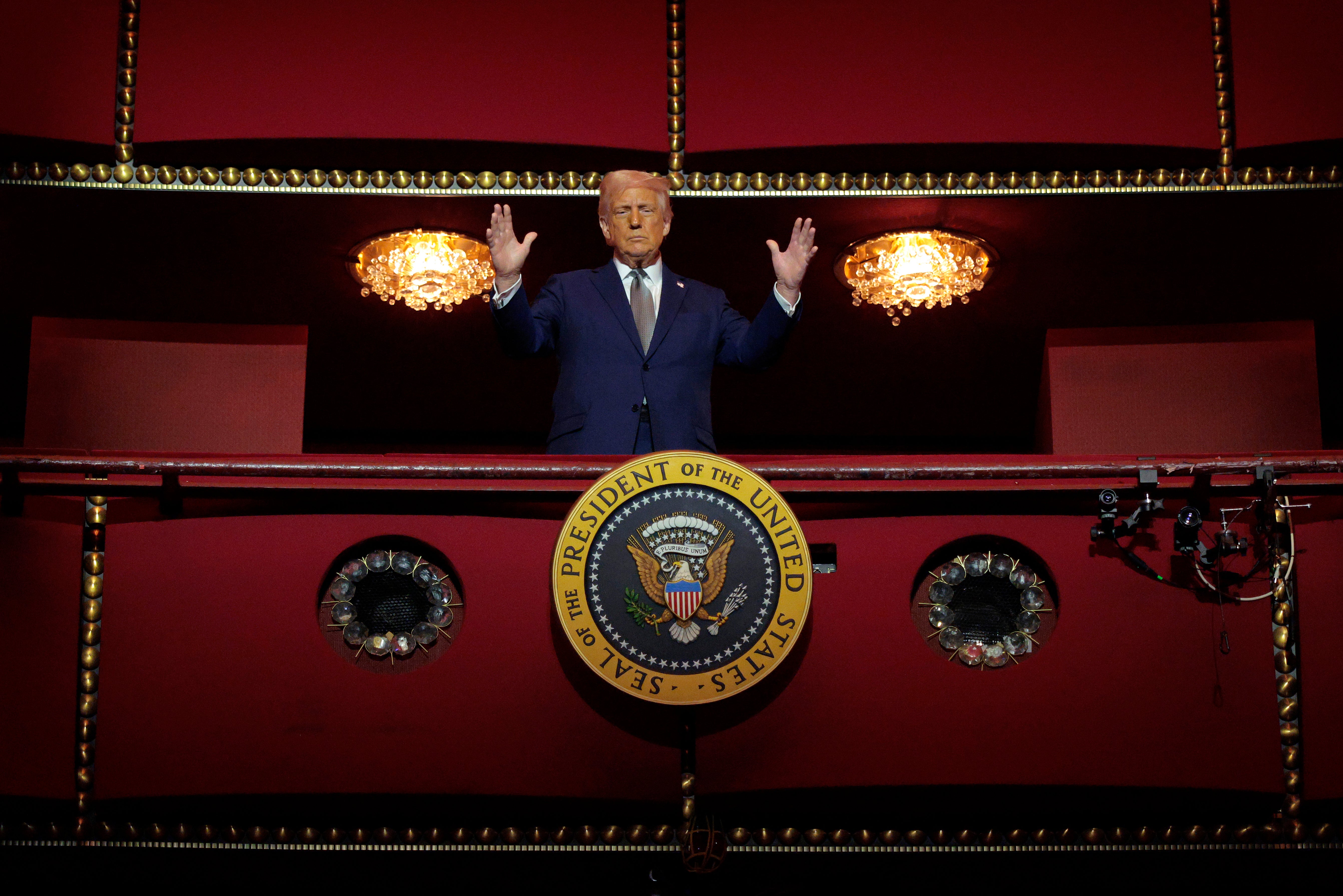 Trump looks down from the presidential box in the Opera House at the John F Kennedy Centre earlier this month