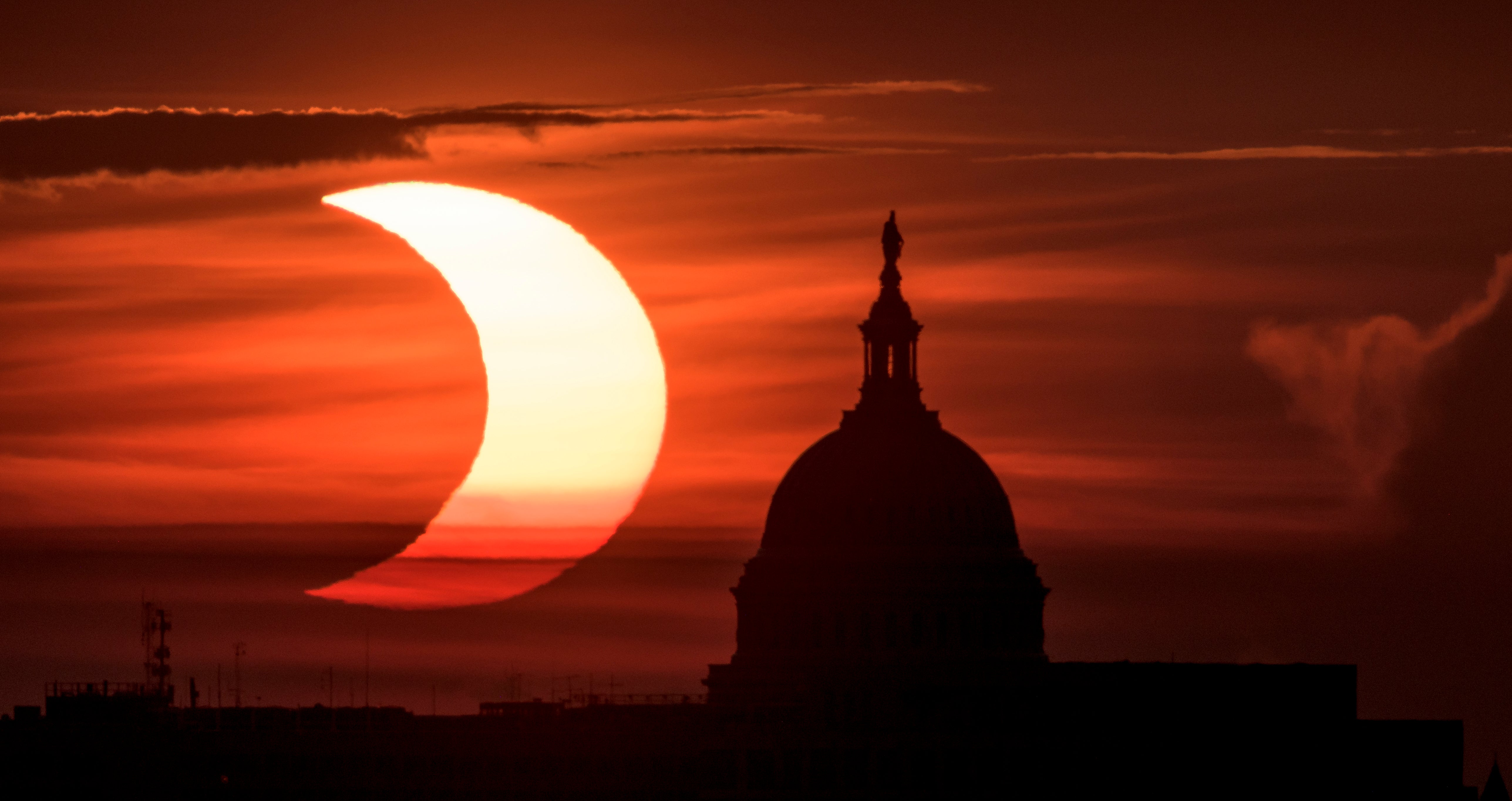 Residents of Washington, D.C., and the Northeast can catch a partial solar eclipse on Saturday. On average, they occur about twice a year