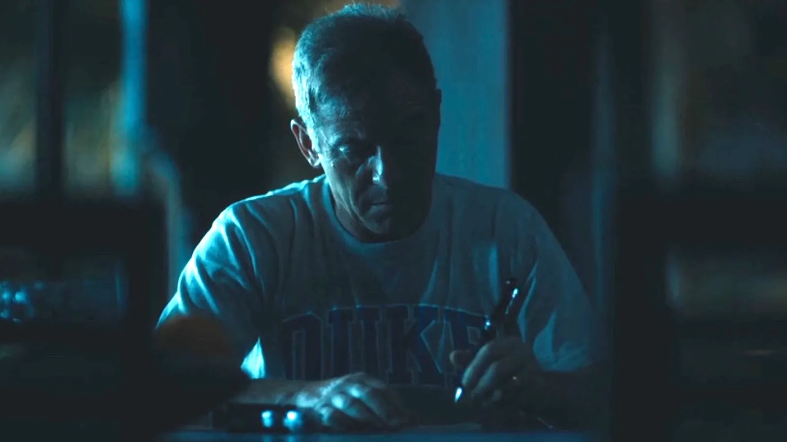 A scene with Jason Isaacs wearing a Duke t-shirt has become meme fodder with the closing in of NCAA college basketball championship March Madness