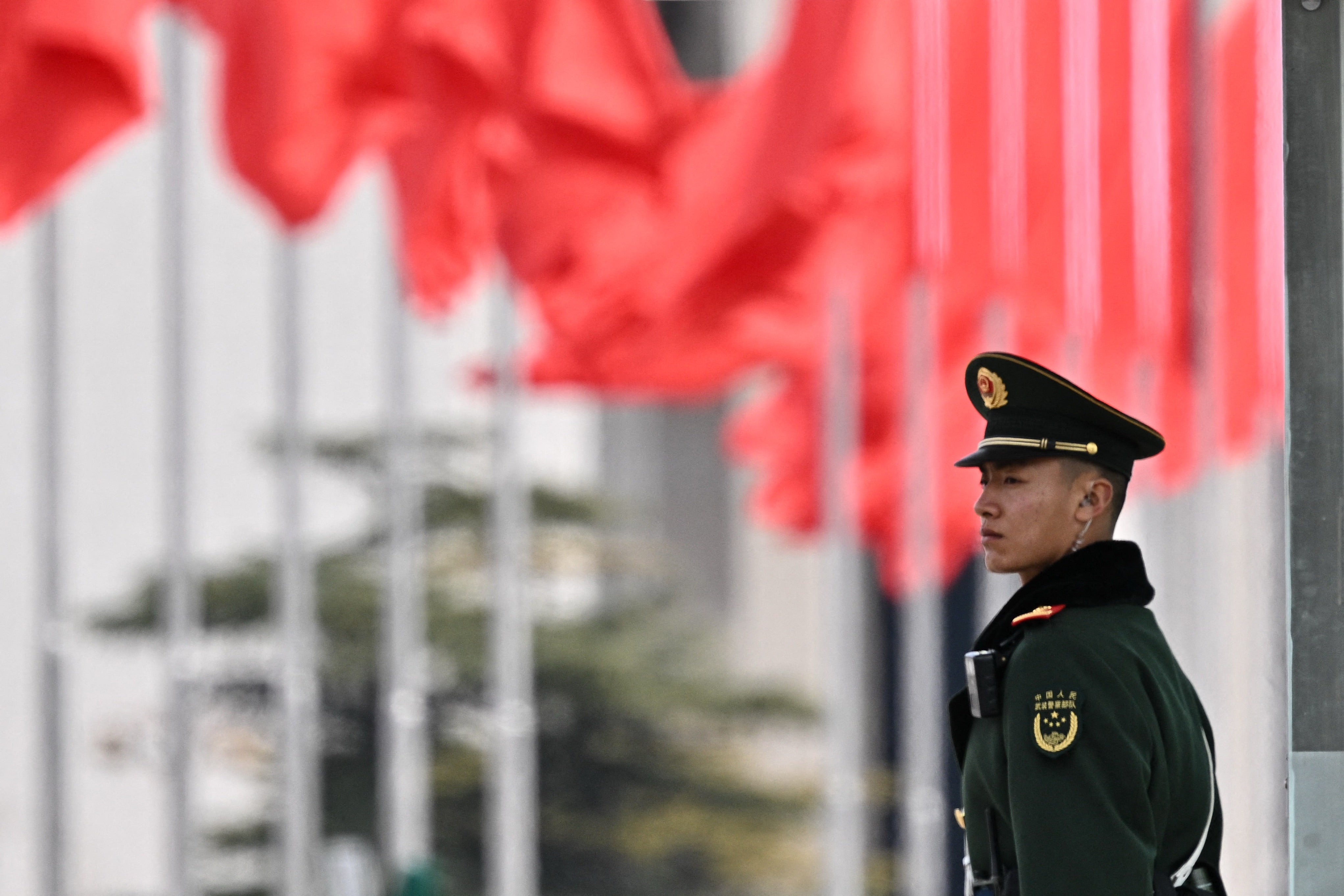 A Chinese paramilitary police officer stands guard at Tiananmen Square