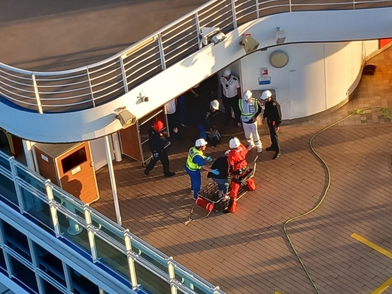 Images released by the Galician Coast Guard show the passenger being taken off the ship