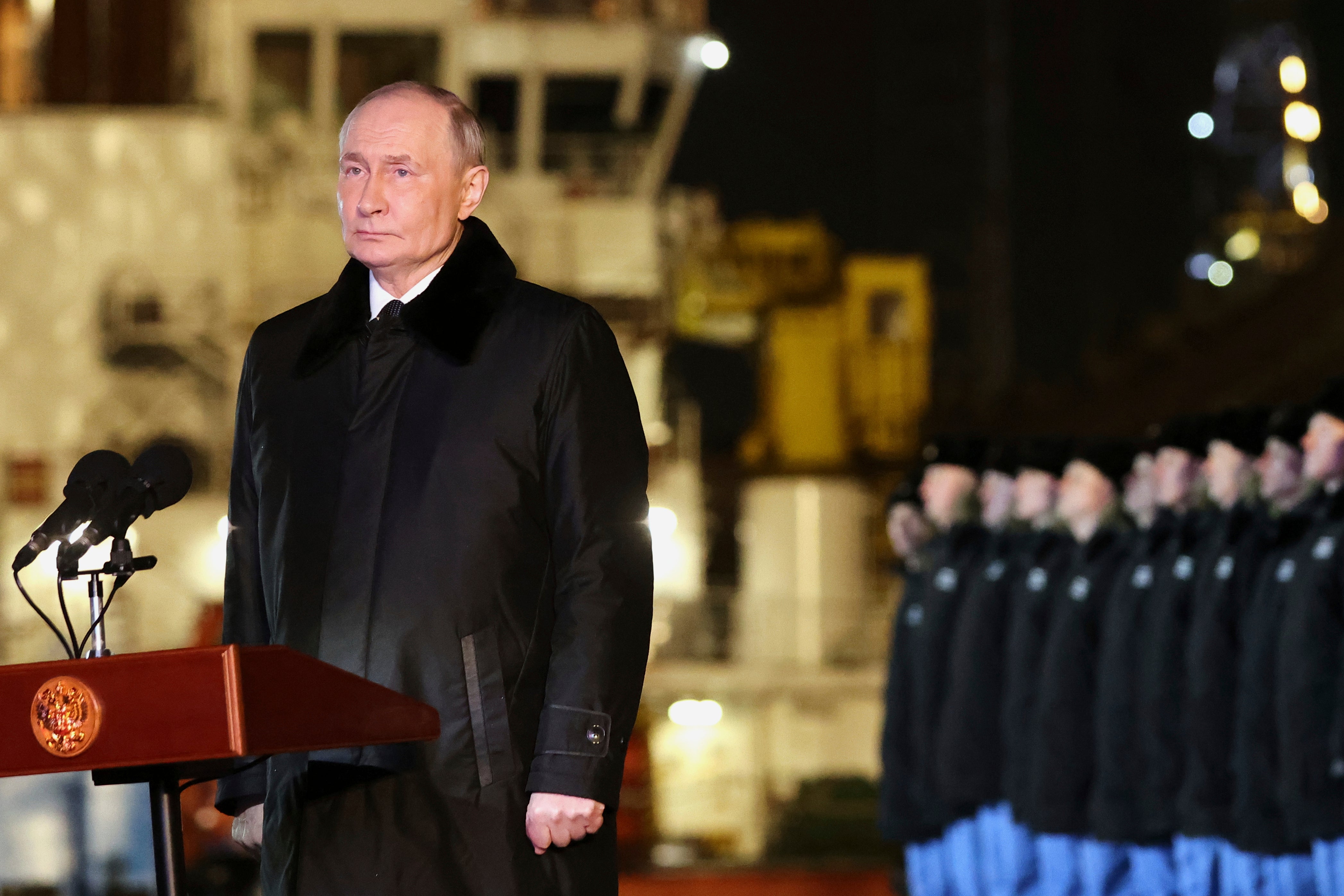 Russian President Vladimir Putin attends a ceremonial ship launching for the nuclear-powered submarine Perm at the Atomflot, a service base for nuclear-powered fleet