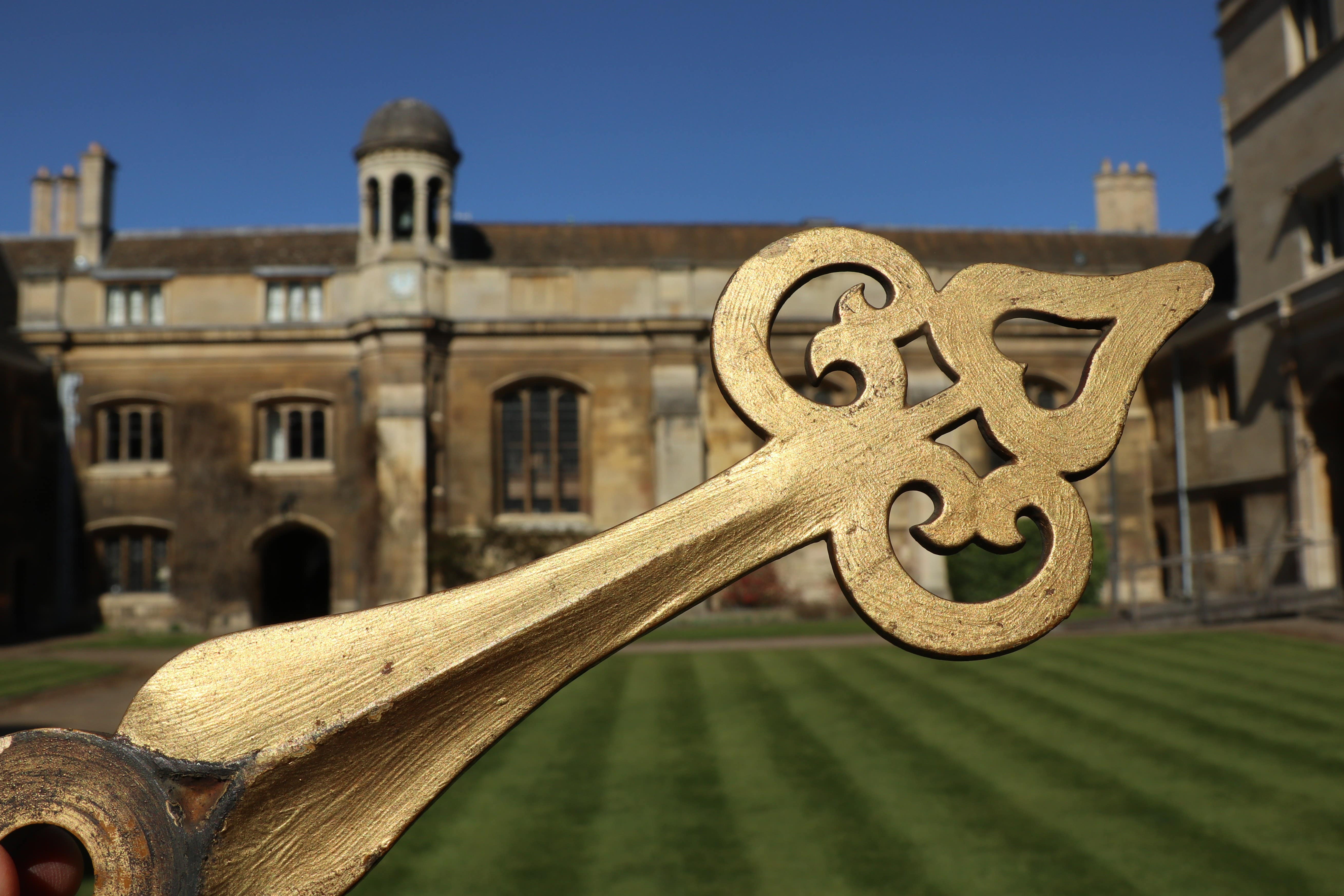 The missing hour hand of the chapel clock at Gonville and Caius College, Cambridge has been returned around 100 years after it was taken in a student prank (Gonville and Caius College/PA)
