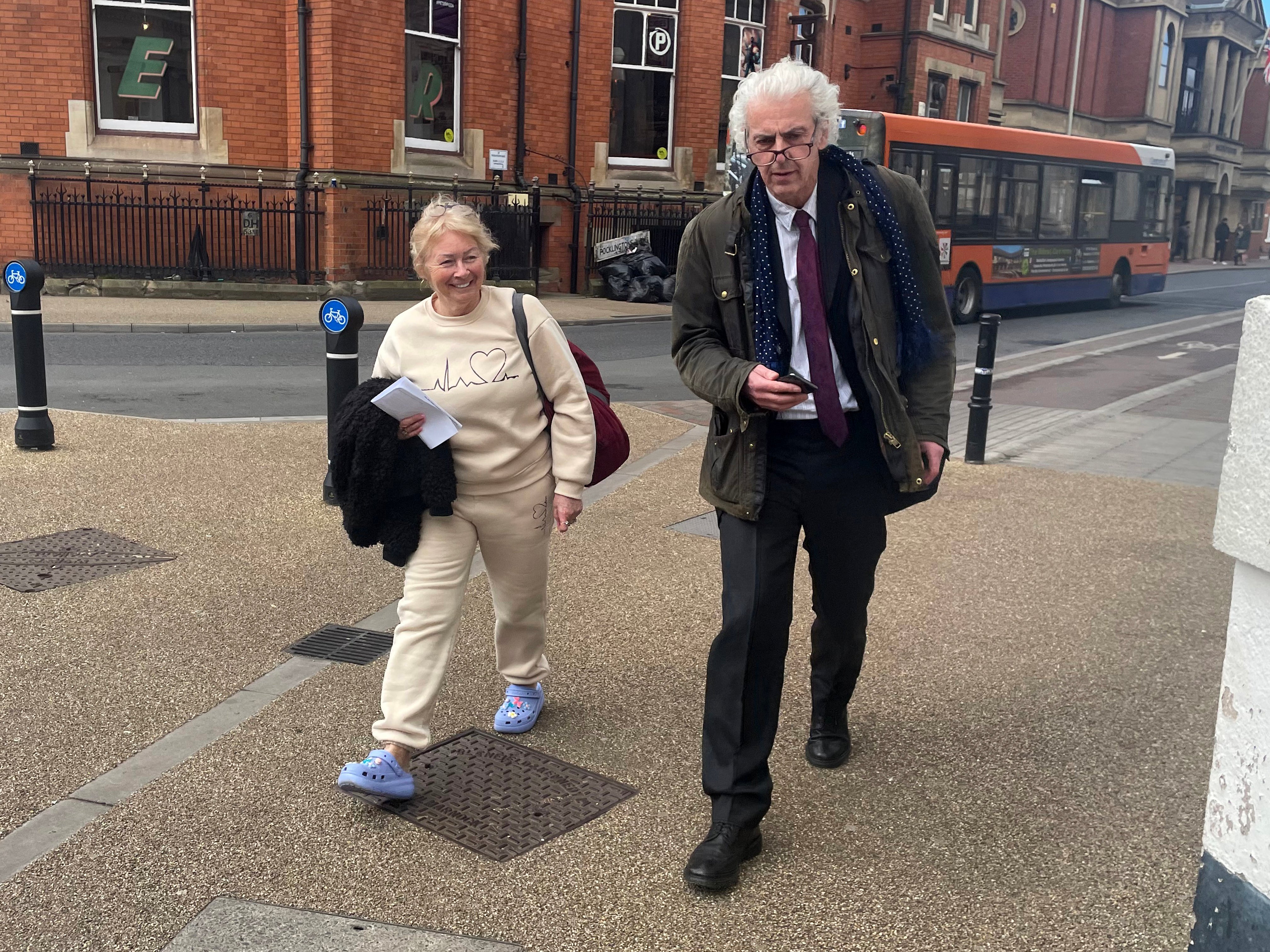 Karen Spragg (left) outside Leicester Magistrates' Court, where she is charged with one count of stalking involving serious alarm or distress between May 3 2024 and February 21 this year.