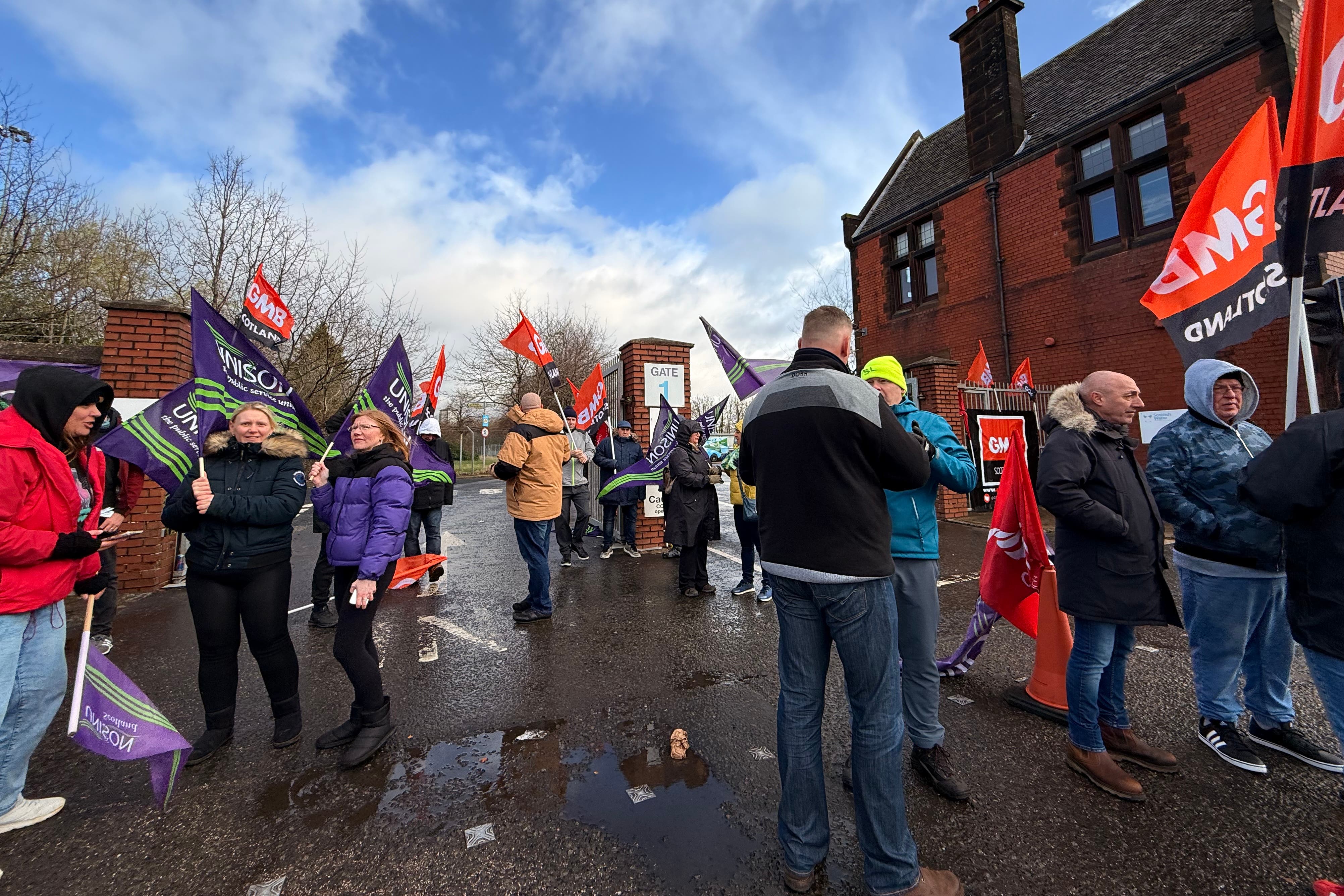Scottish Water workers gathered on a picket line outside the waste water treatment centre in Glasgow (Craig Meighan/PA)