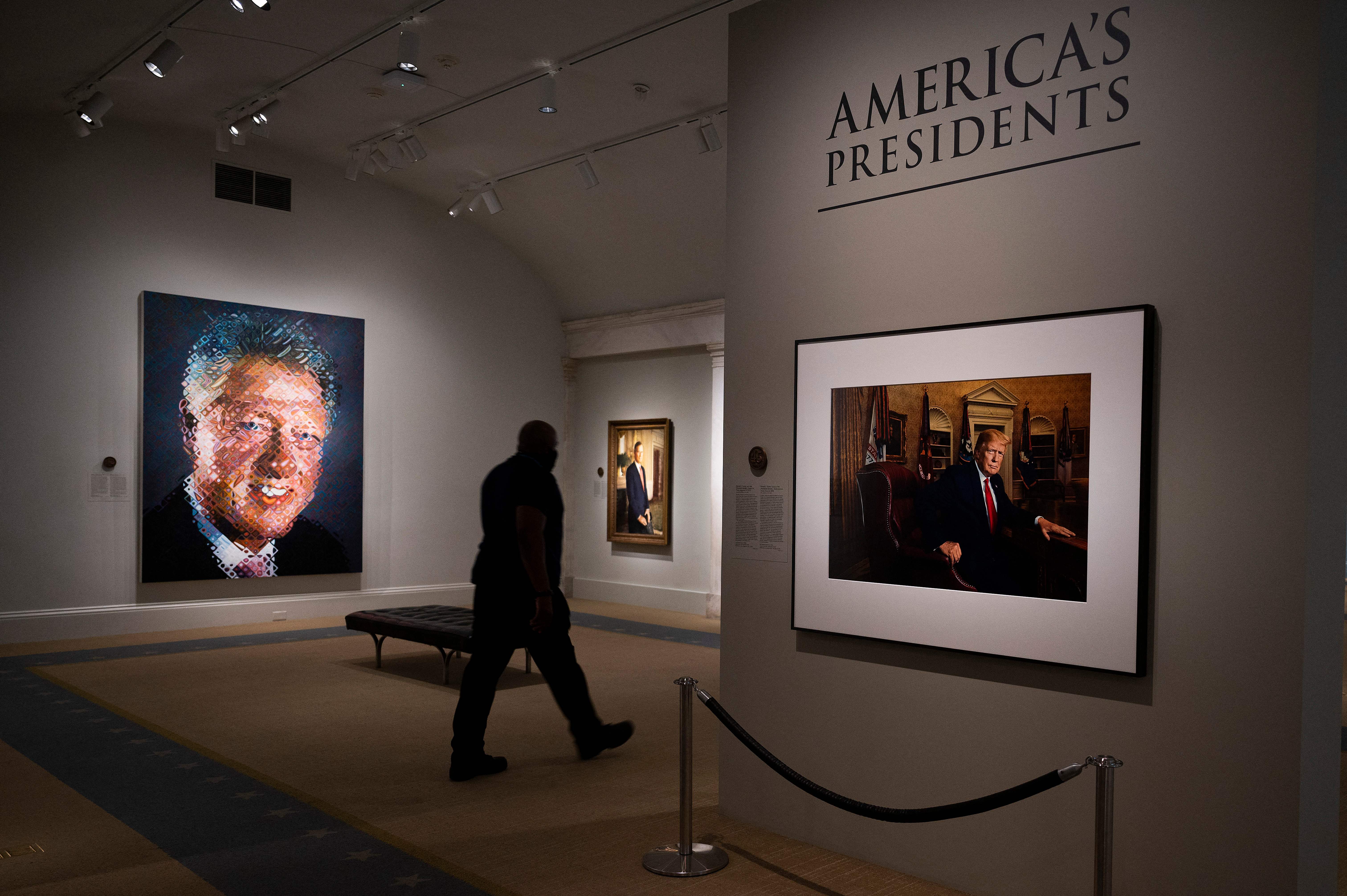 A photograph of former US President Donald Trump hangs on the wall at the Smithsonian National Portrait Gallery in Washington, DC, on May 14, 2021