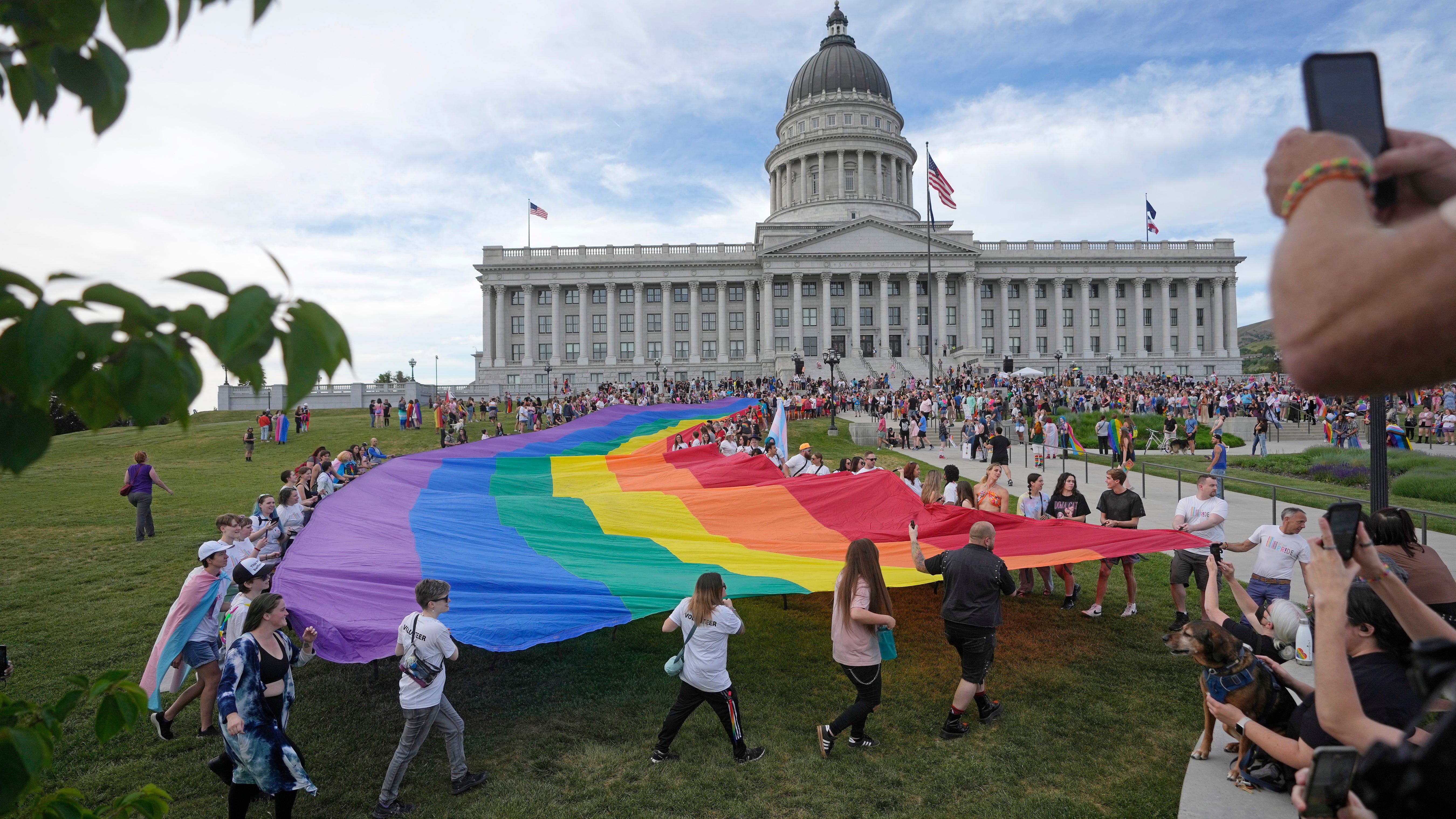 People march following a Pride rally at the Utah State Capitol Friday, June 2, 2023, in Salt Lake City. (AP Photo/Rick Bowmer, File)