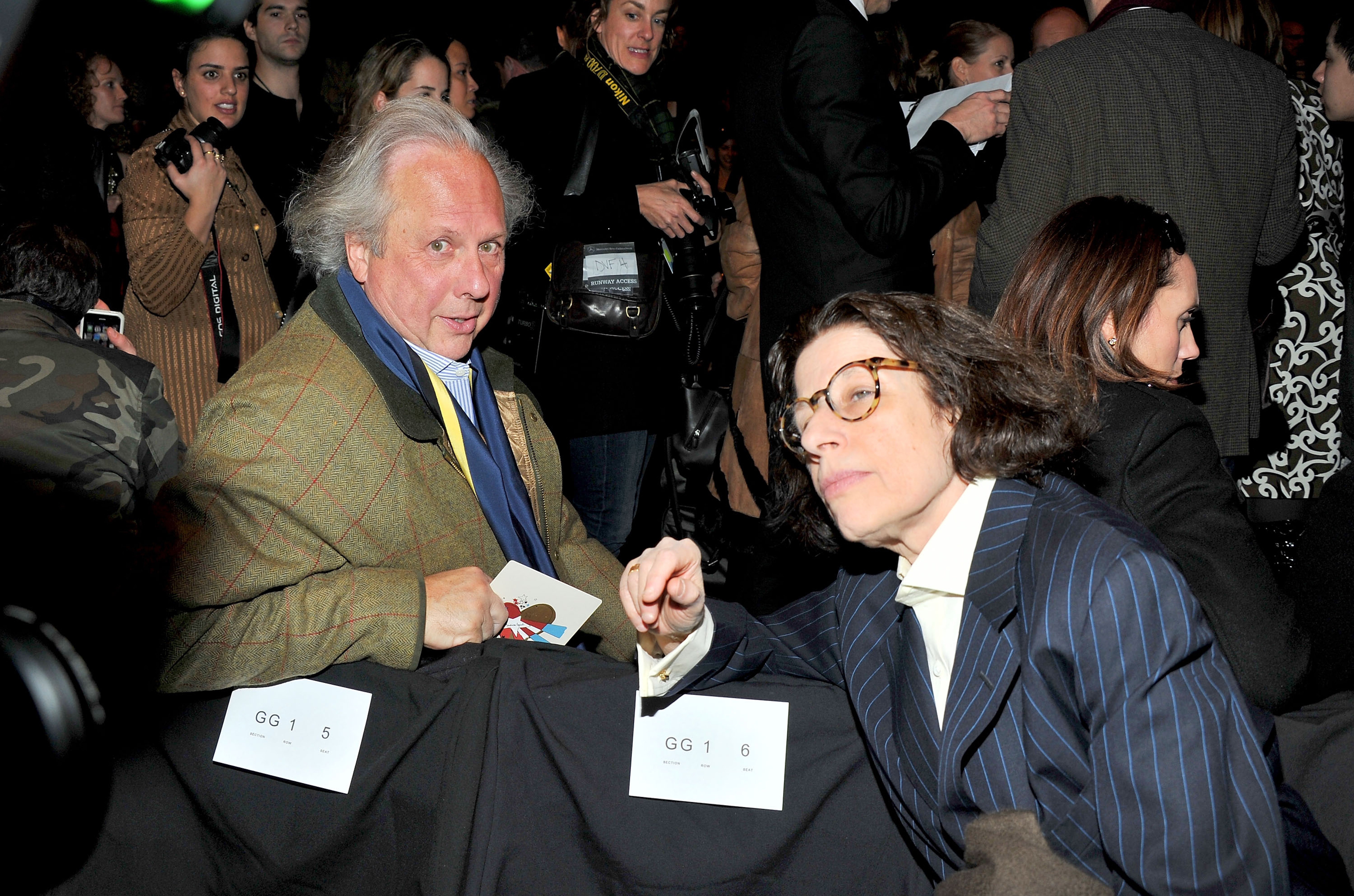 Front row: Graydon Carter and Fran Lebowitz pictured at a Diane von Furstenberg fashion show in 2011