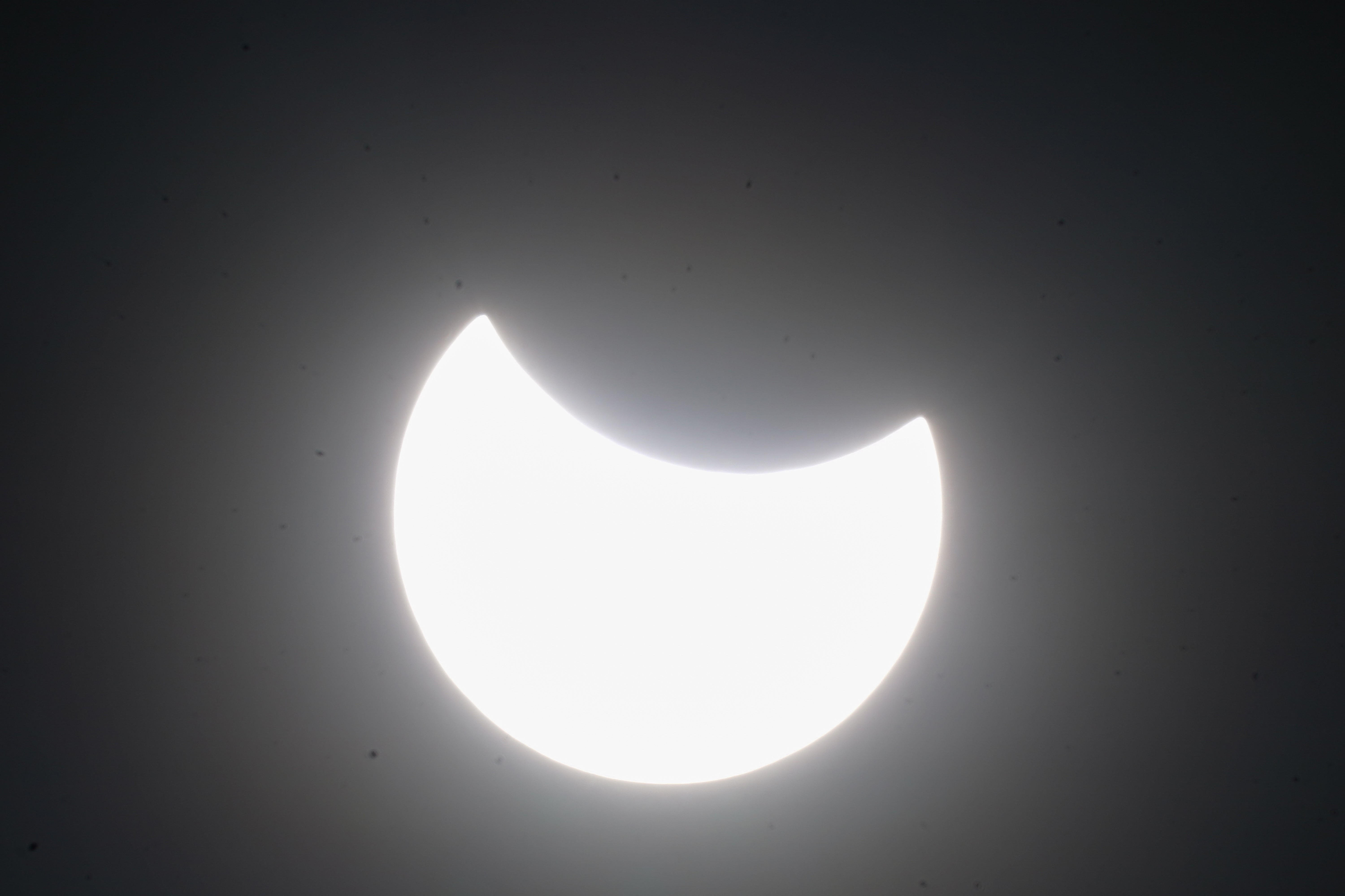 The partial solar eclipse seen in Warwickshire (Jacob King/PA)