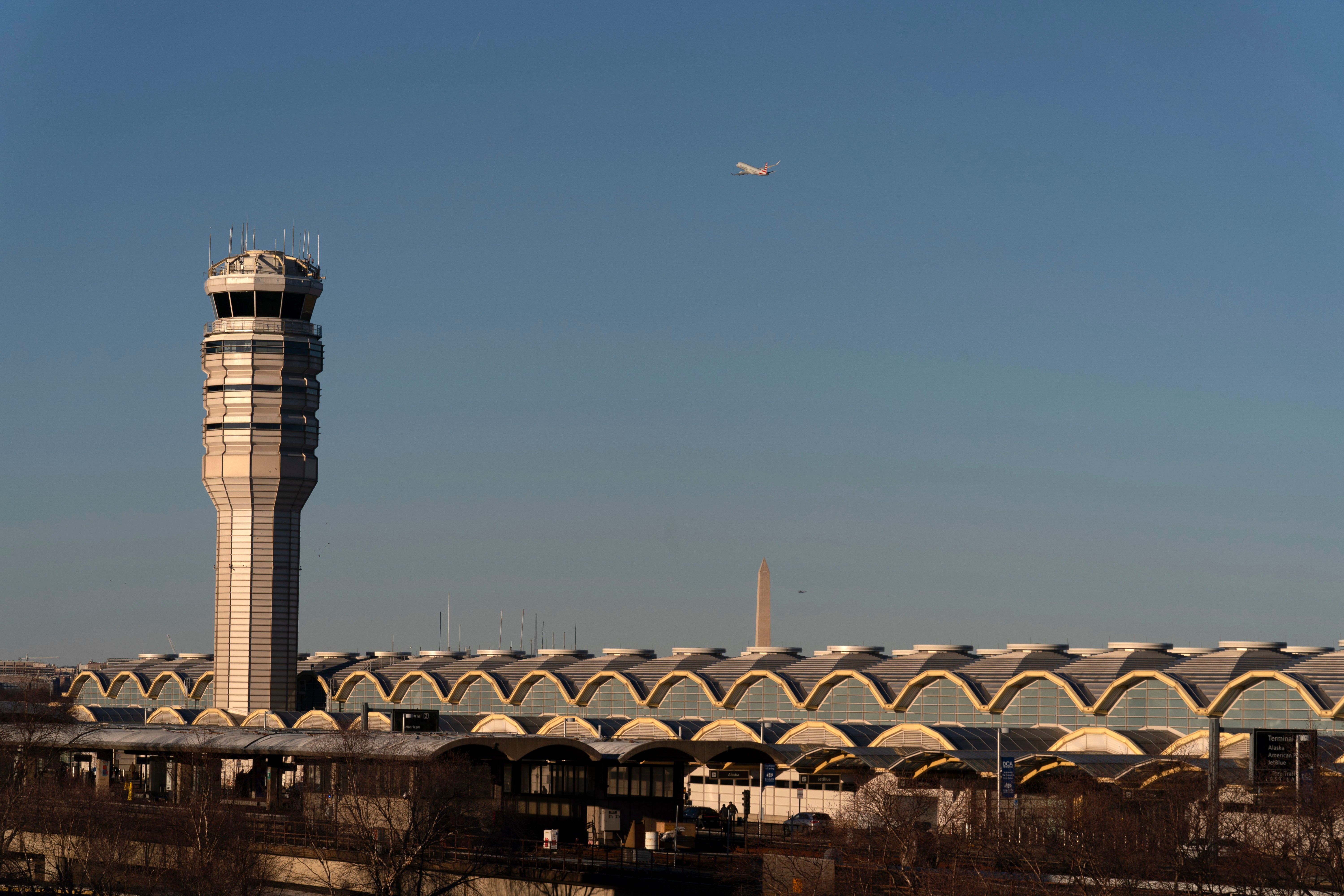 The air traffic control tower at Ronald Reagan Washington National Airport is pictured, Saturday, Feb. 1, 2025, in Arlington, Va. (AP Photo/Jose Luis Magana)