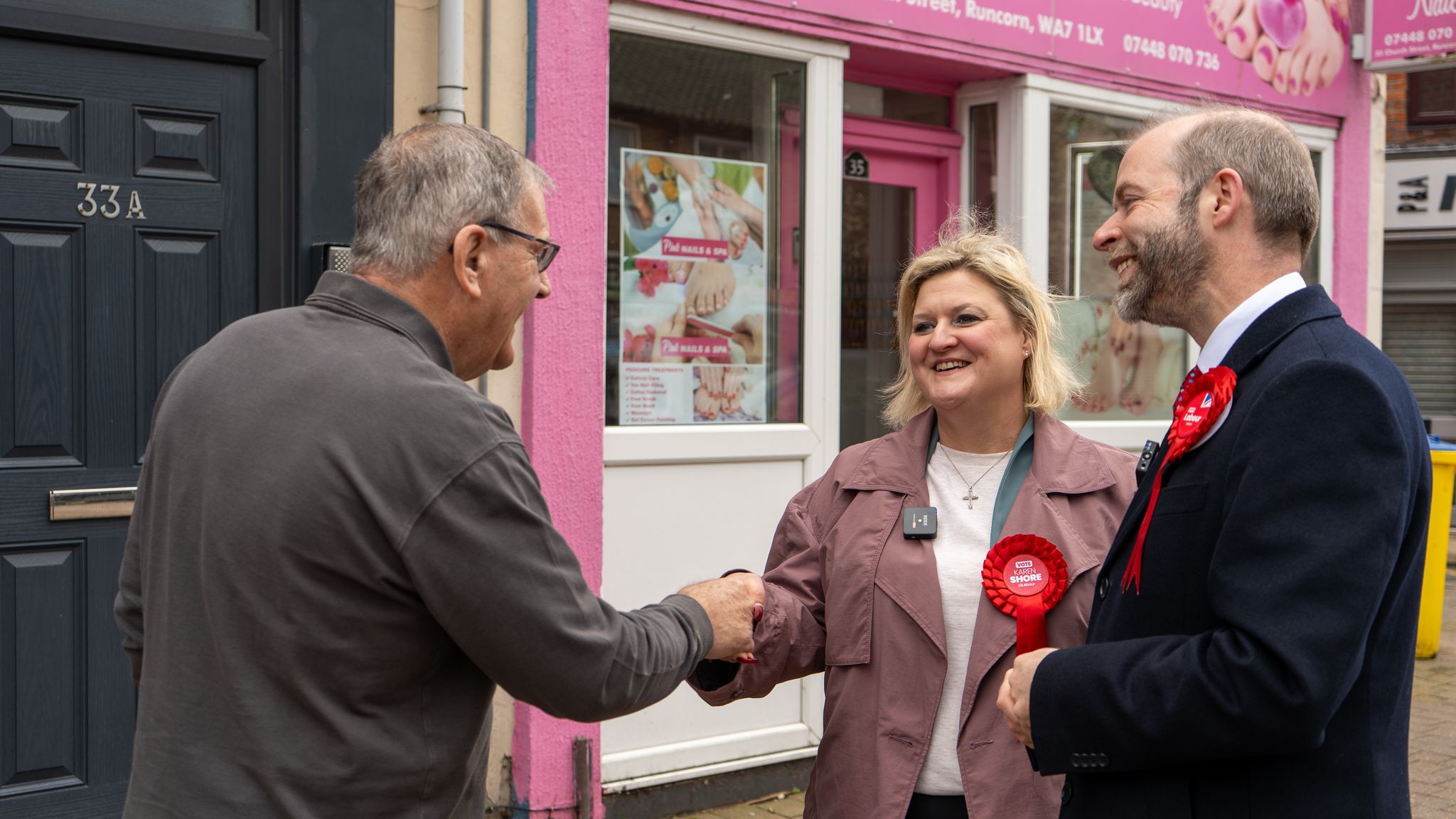 Labour candidate Karen Shore meets a constituent in Runcorn