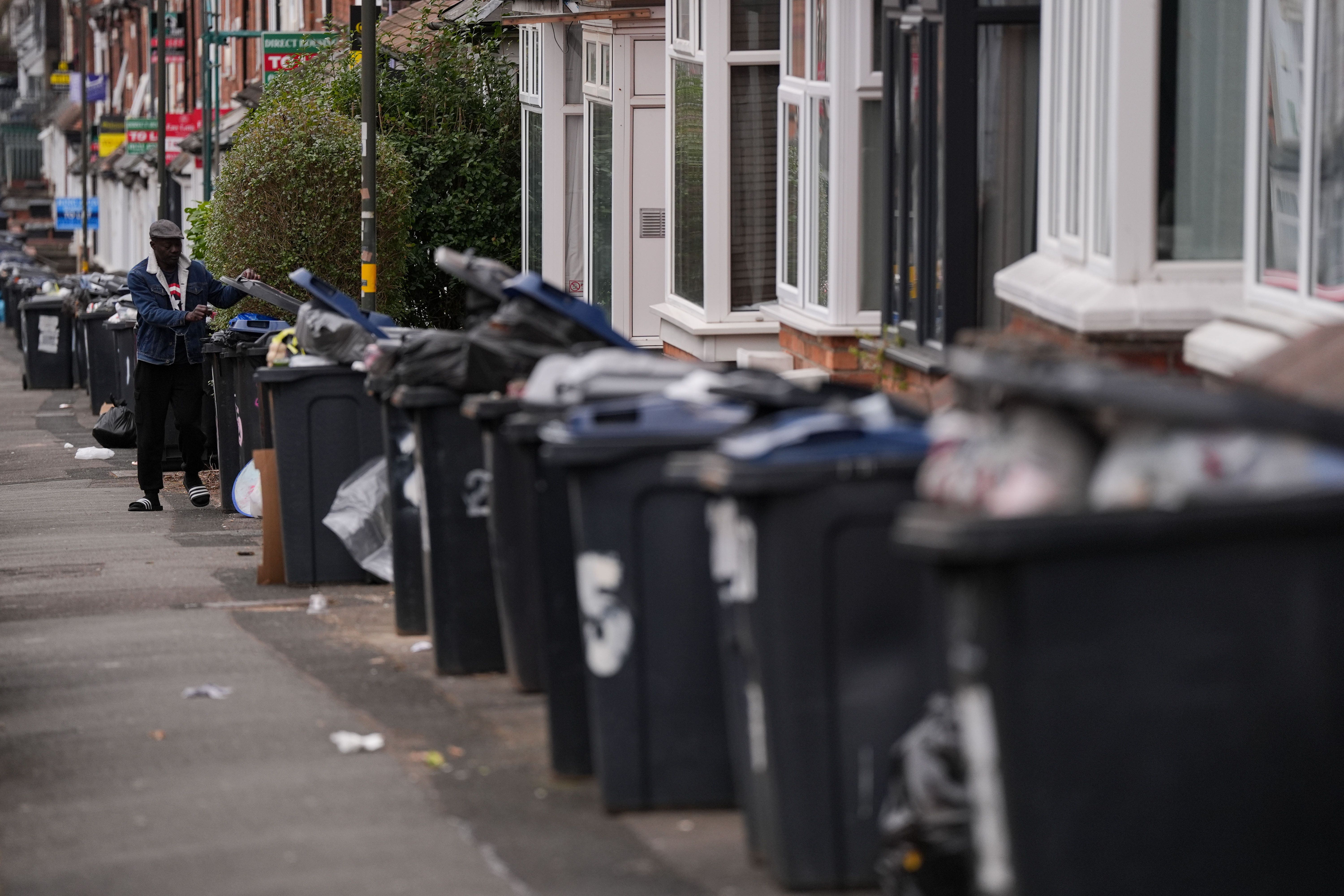 Overflowing bins in the Selly Oak area of Birmingham, amid an ongoing refuse workers’ strike (Jacob King/PA)