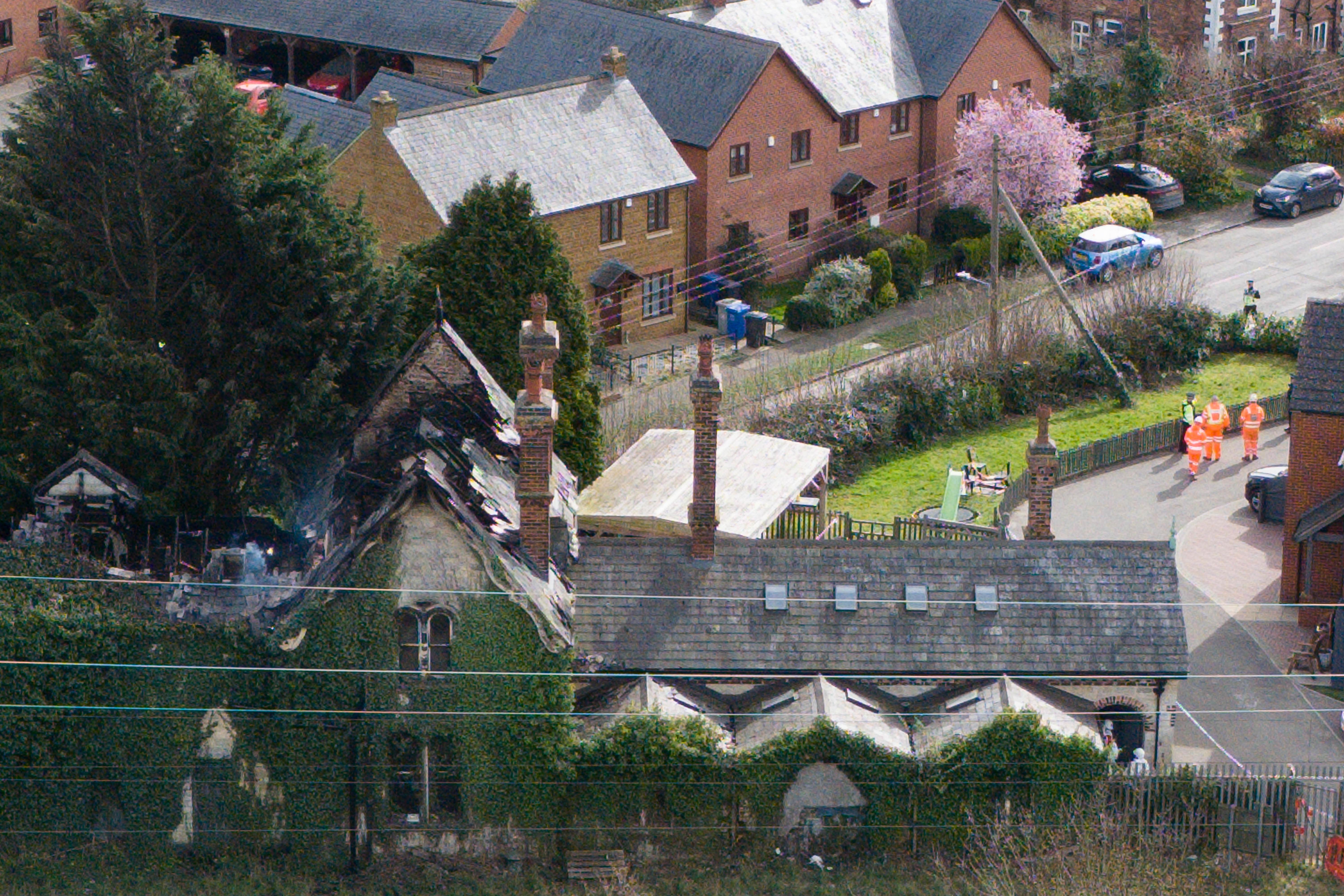 The fire ripped through a historic former station house in Beswick Close, Rushton, near Kettering (Jacob King/PA)