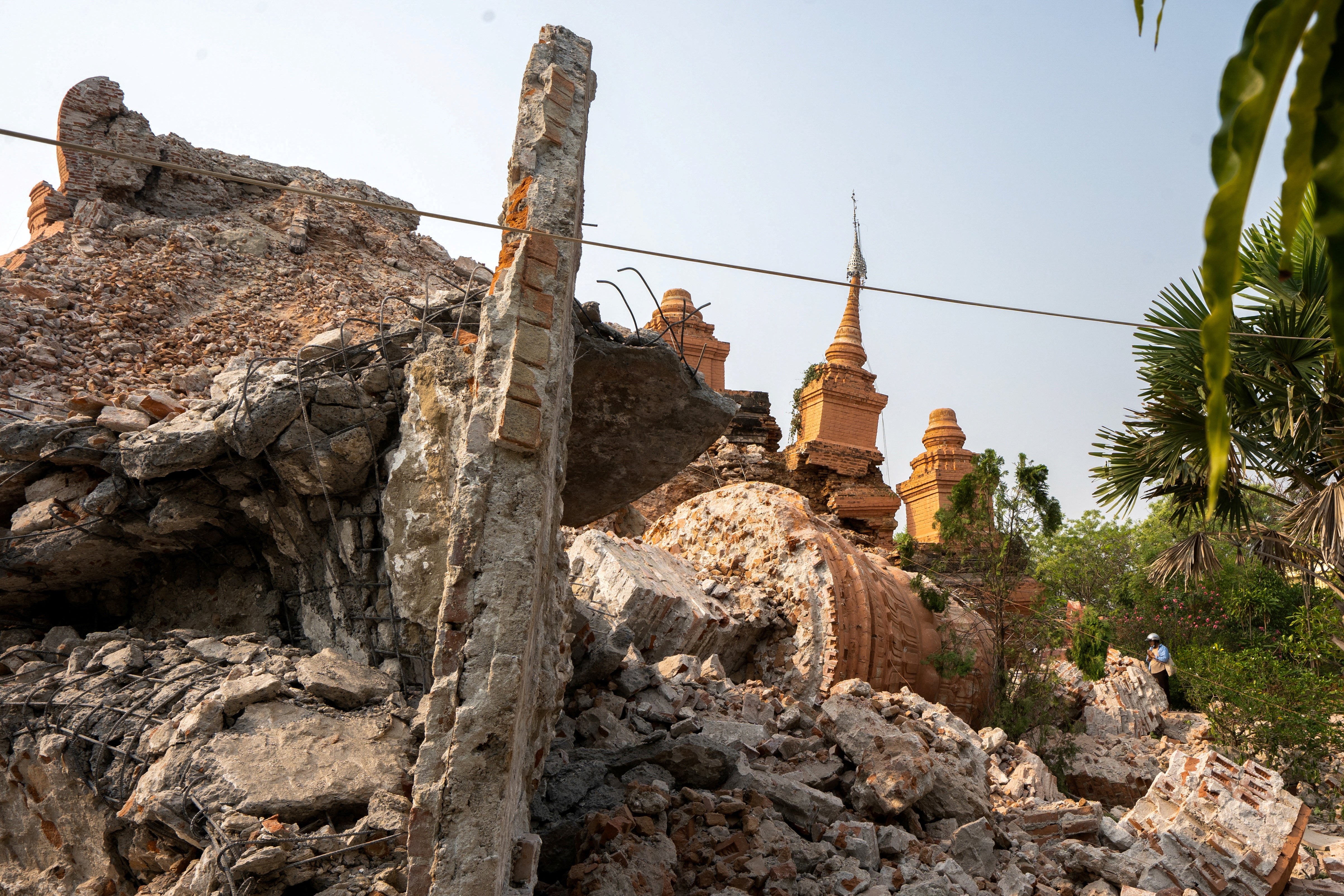 Rubble lies near a pagoda damaged during a strong earthquake, in Mandalay