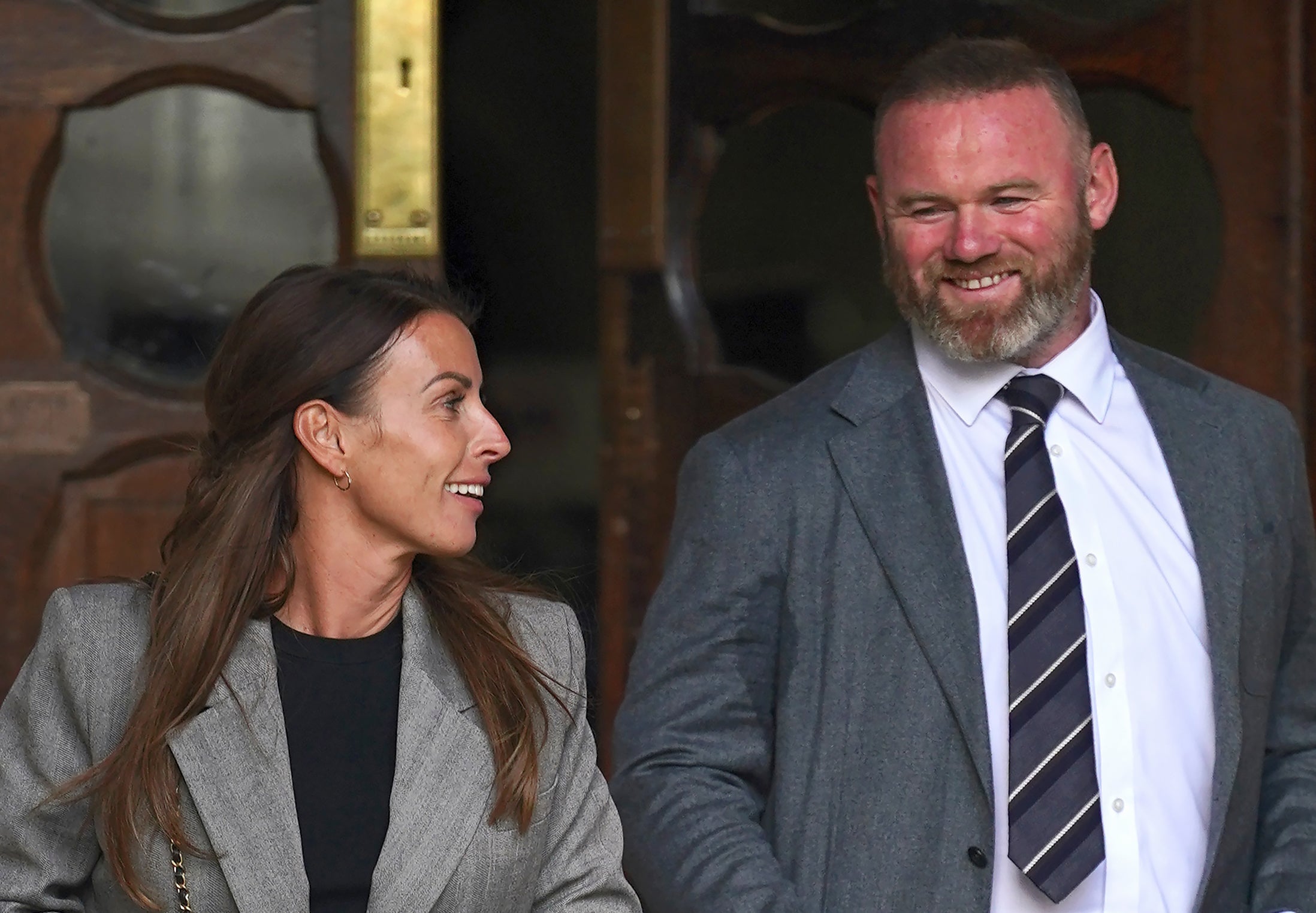 Coleen Rooney, pictured with her husband Wayne, accused Ms Vardy of leaking private information about her to the press
