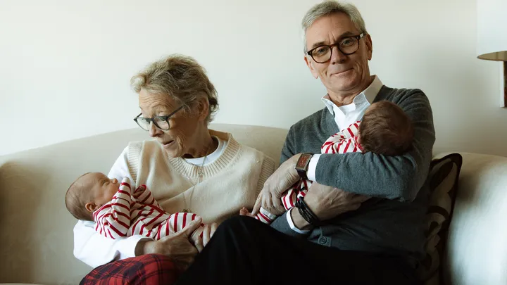 Beverley Angell and her husband Nick with their grandchildren